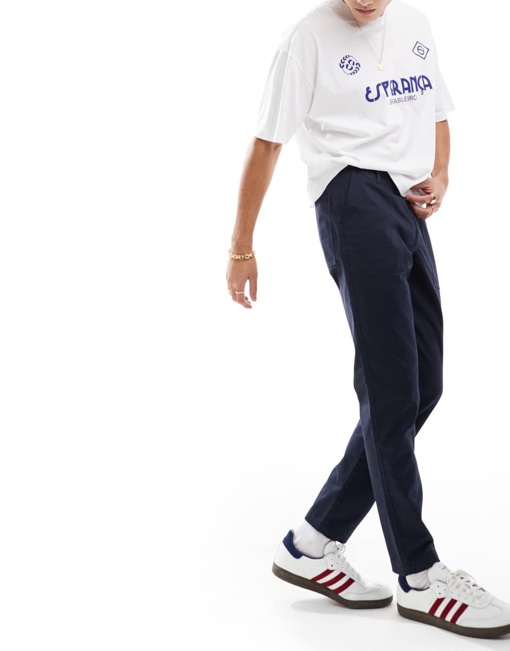 ASOS DESIGN tapered pants in navy Product Image