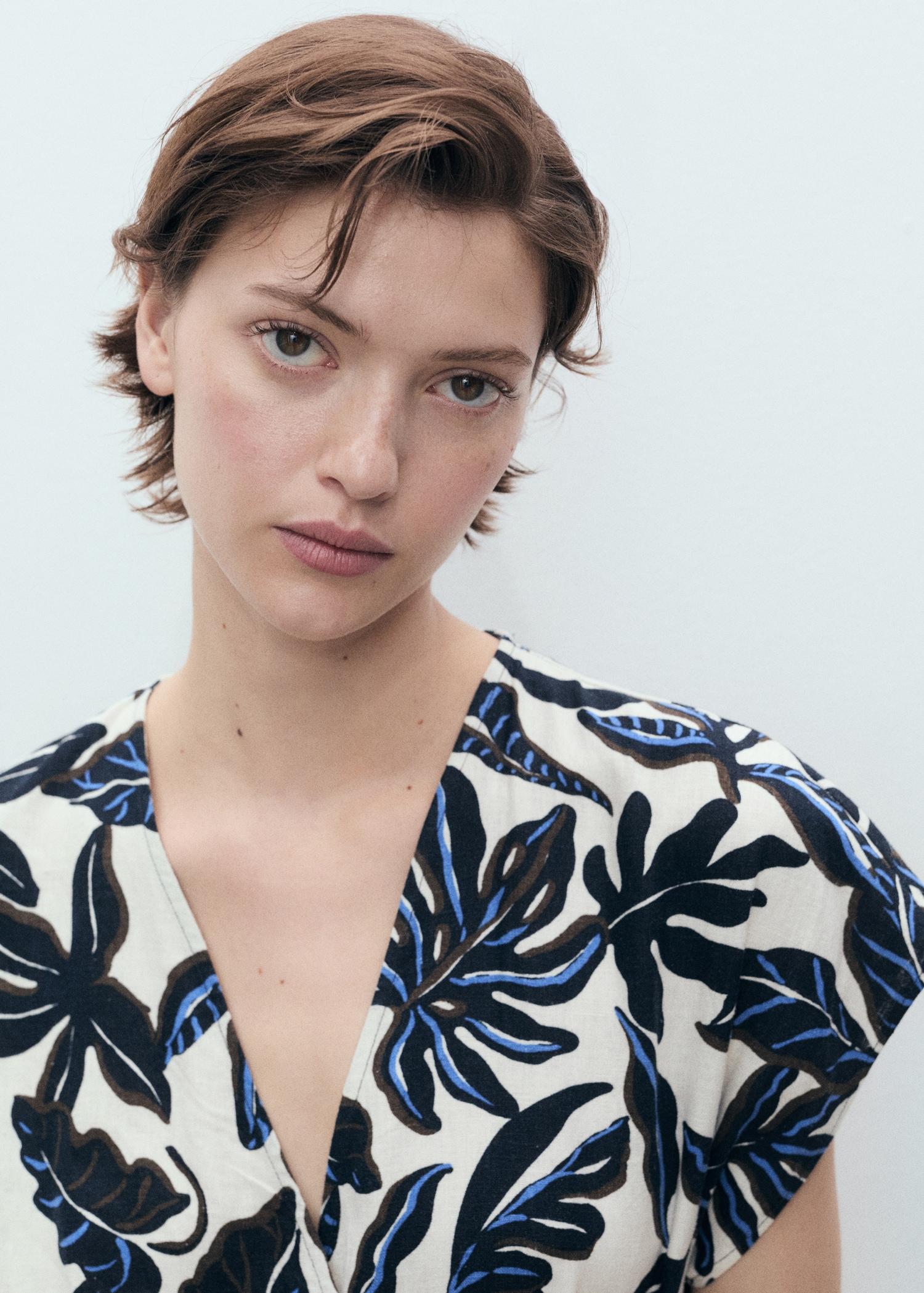 Printed linen jumpsuit with belt - Women | MANGO USA Product Image