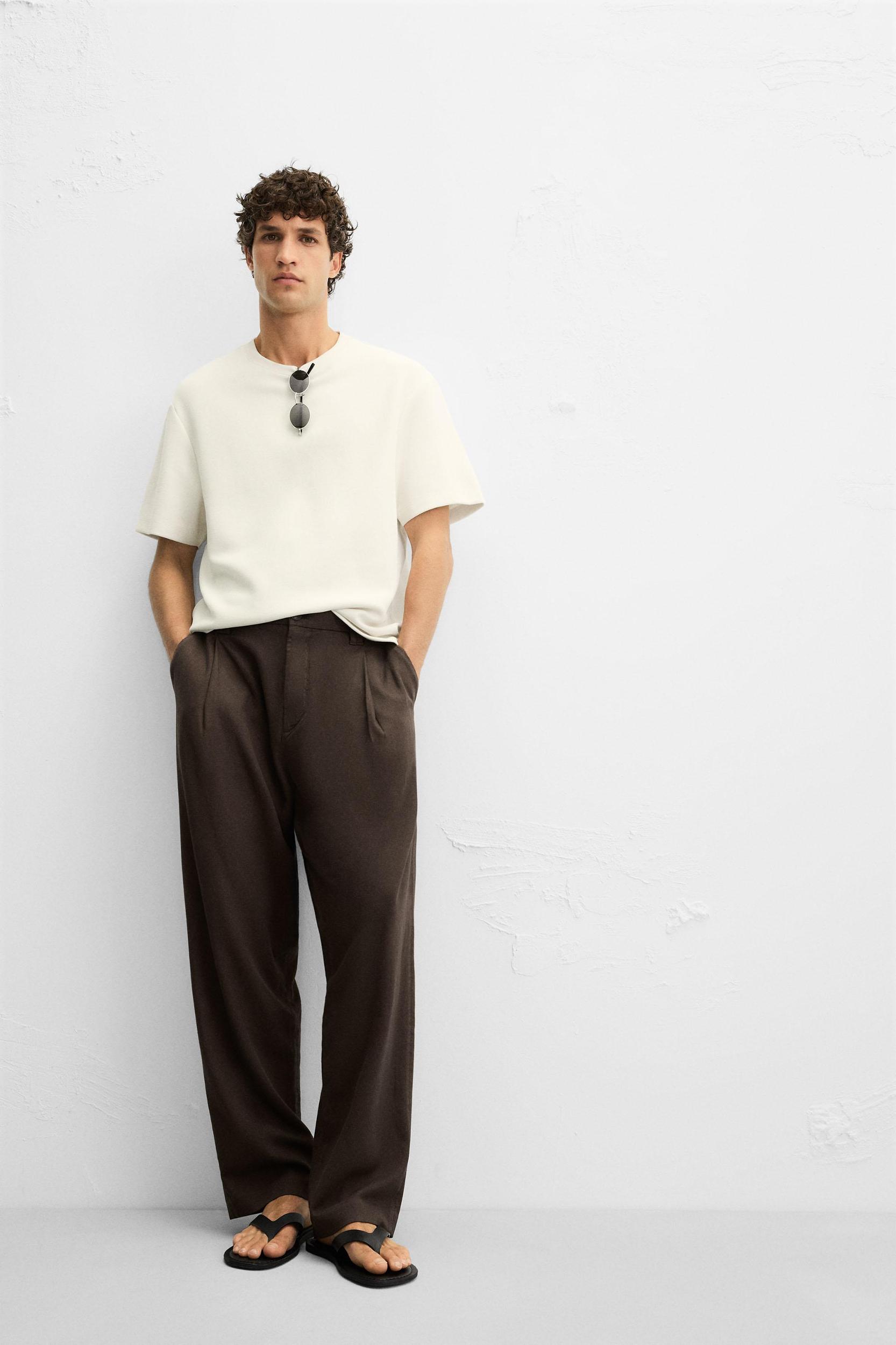 FLOWY PLEATED PANTS Product Image