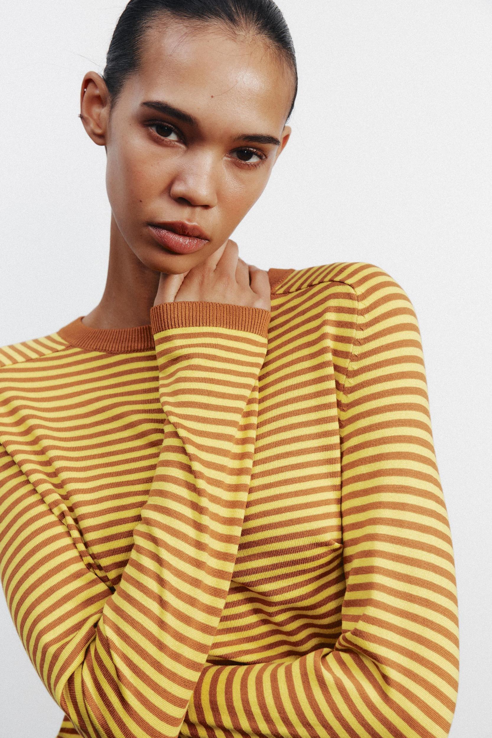 STRIPED KNIT SWEATER Product Image