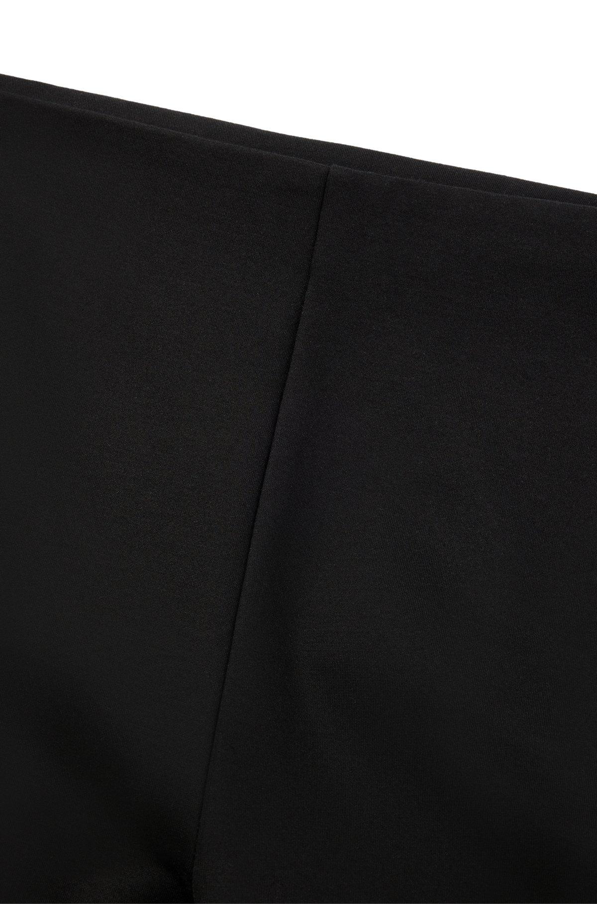 Relaxed-fit trousers in stretch fabric with flared leg Product Image