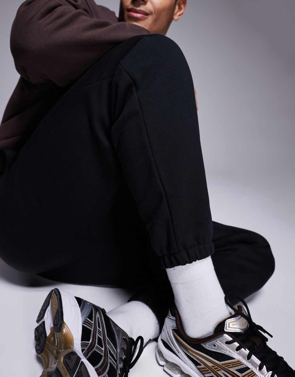 ASOS DESIGN premium heavyweight tapered sweatpants 400gsm in black Product Image