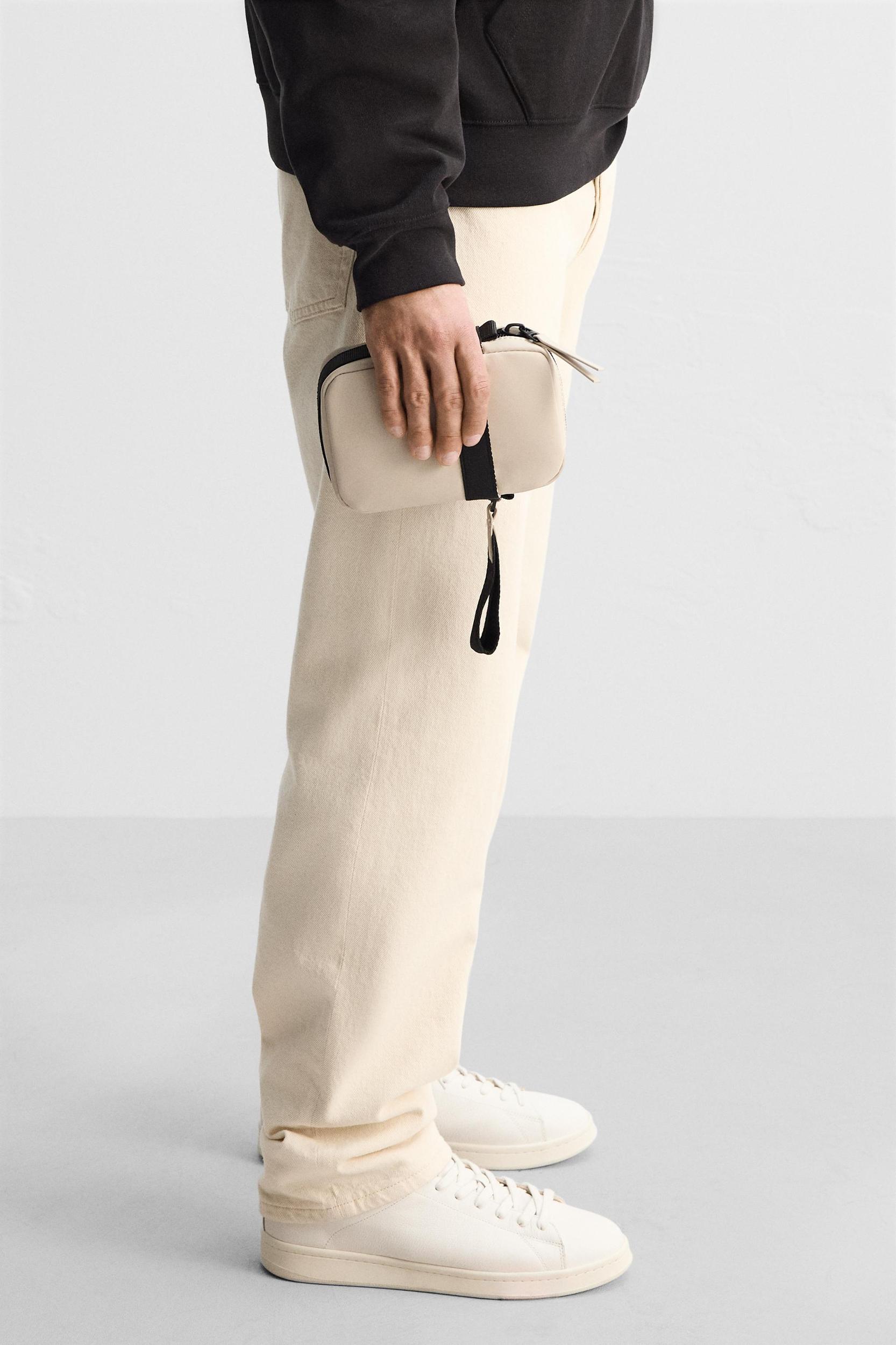 RUBBERIZED CROSSBODY BAG Product Image