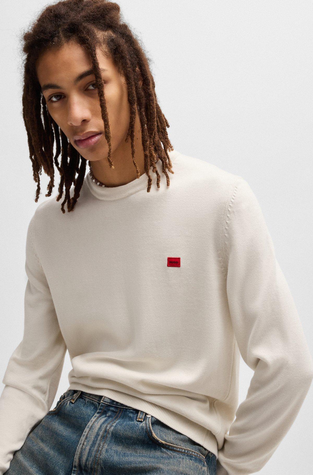 Cotton sweater with red logo label Product Image