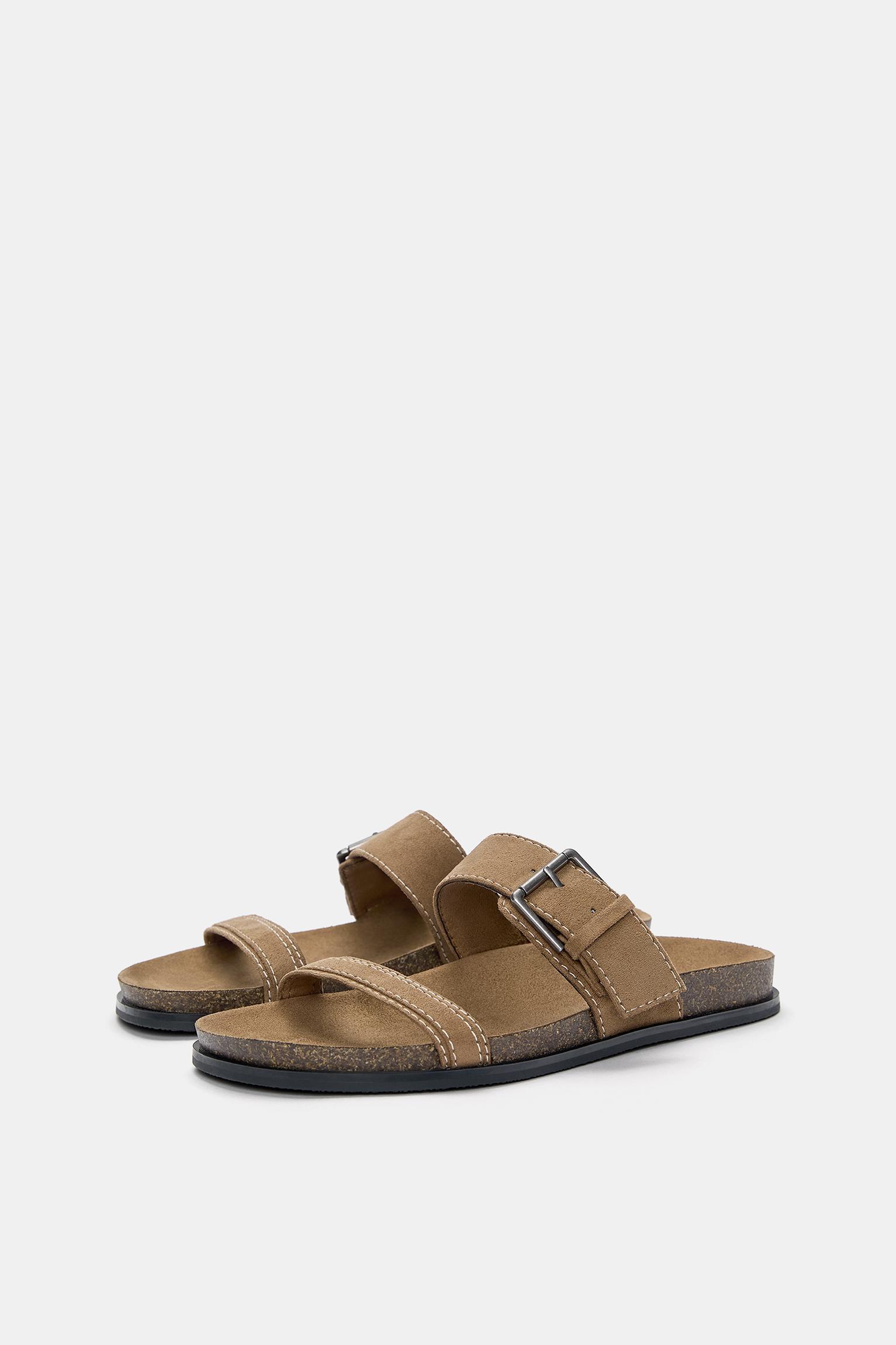 Flat sandals with buckles Product Image