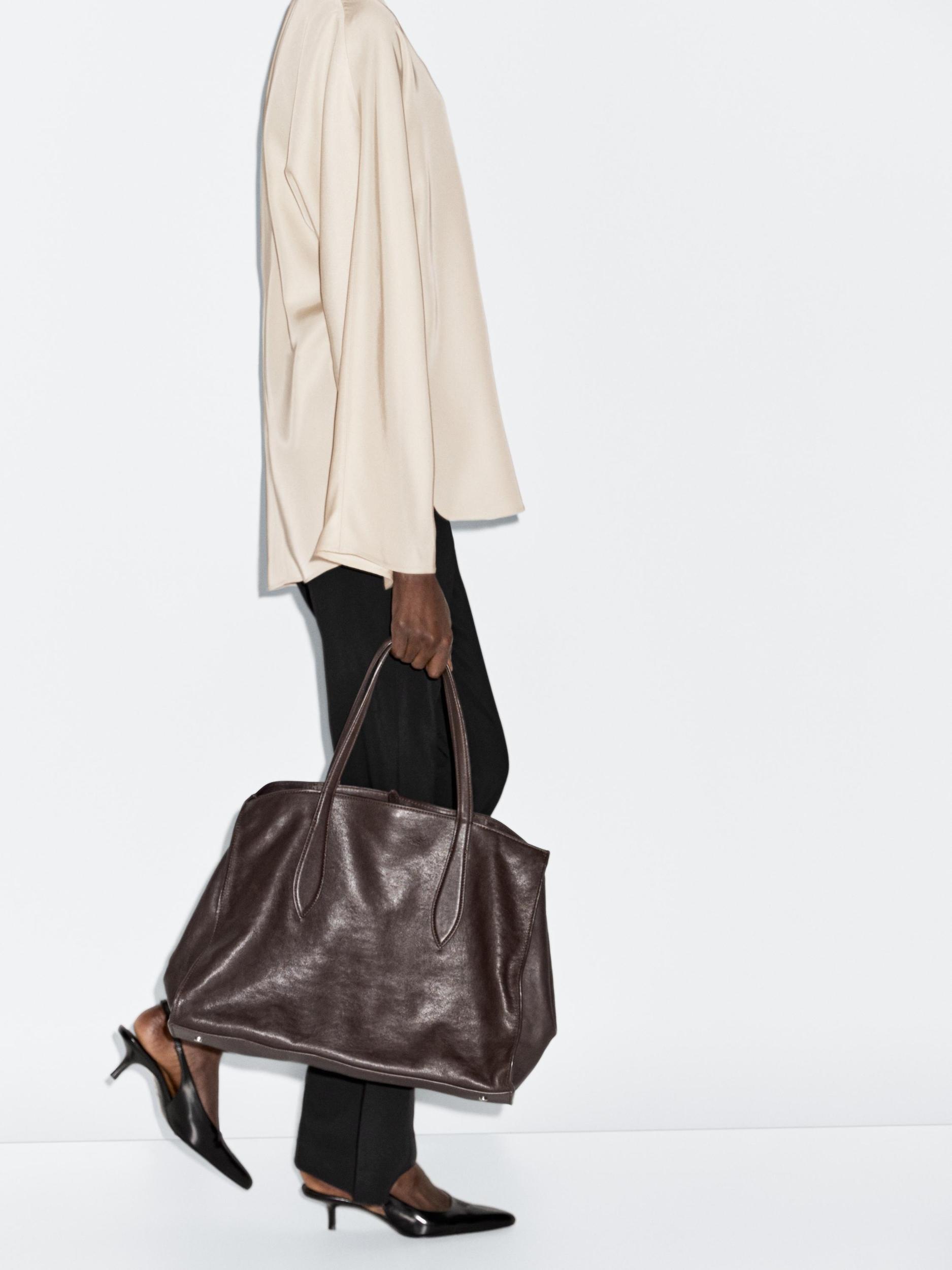 Flowing blouse with slit details Product Image