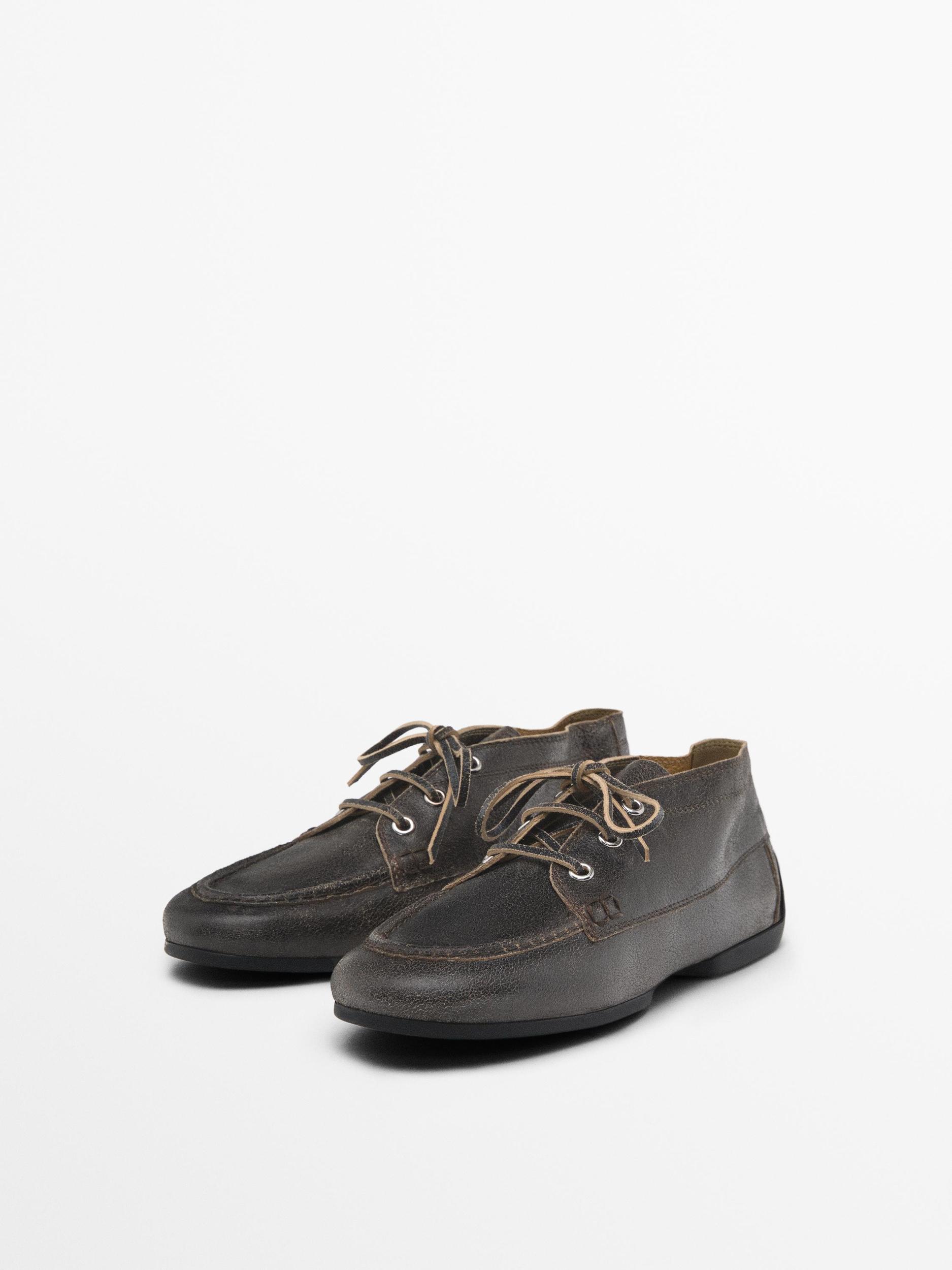 Leather boot-style deck shoes Product Image