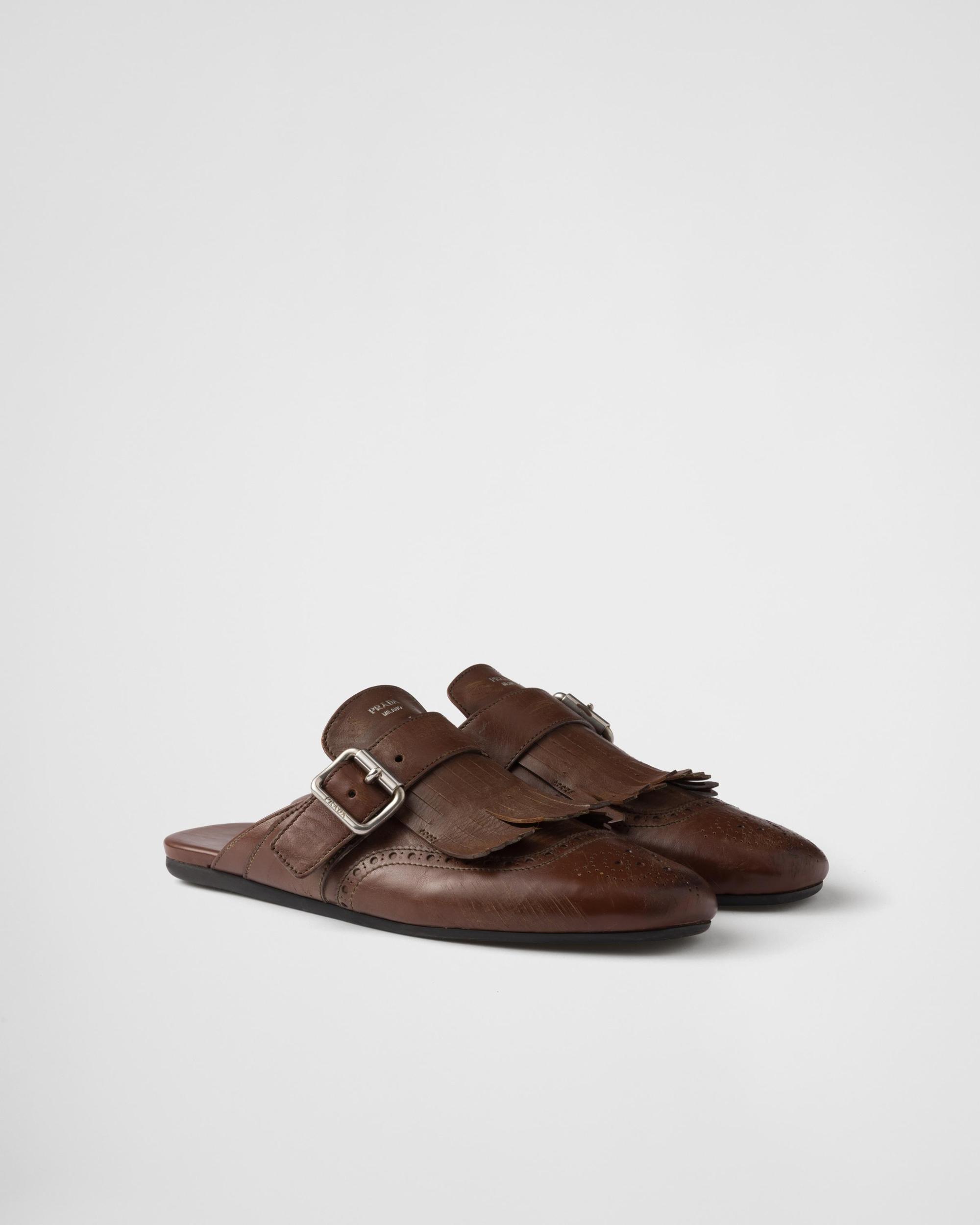 Shuffle fringed leather mules Product Image