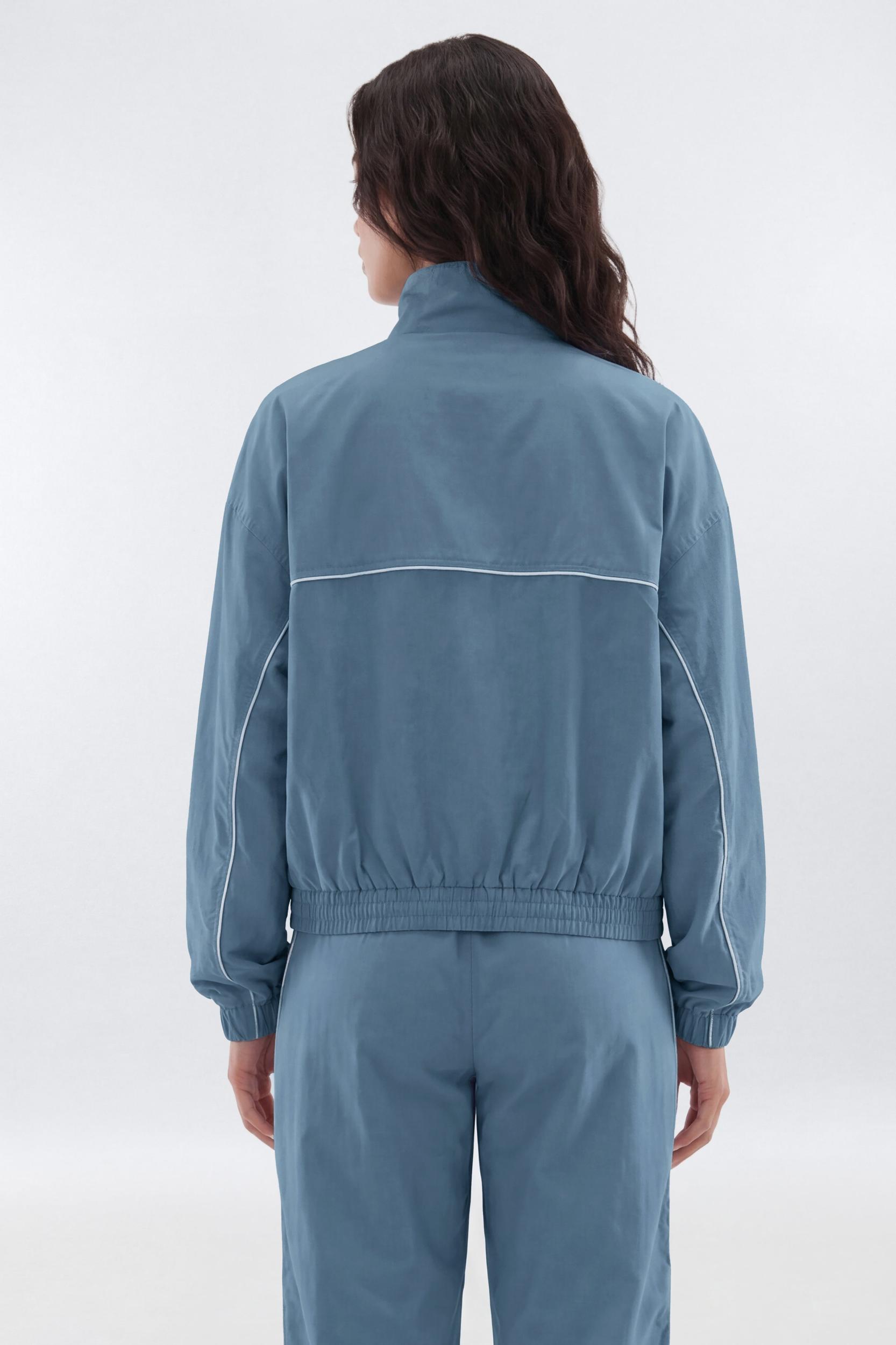 CoreNylon Mock Neck Full Zip Track Jacket - Soft Indigo Female Product Image