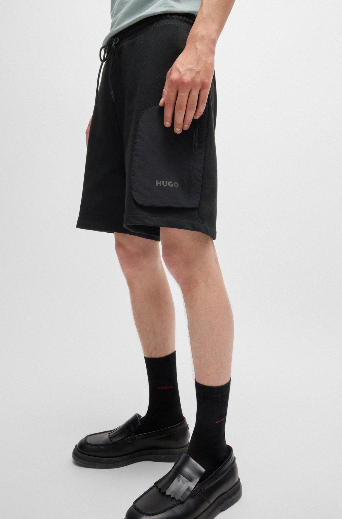 Cotton-terry relaxed-fit shorts with logo print Product Image