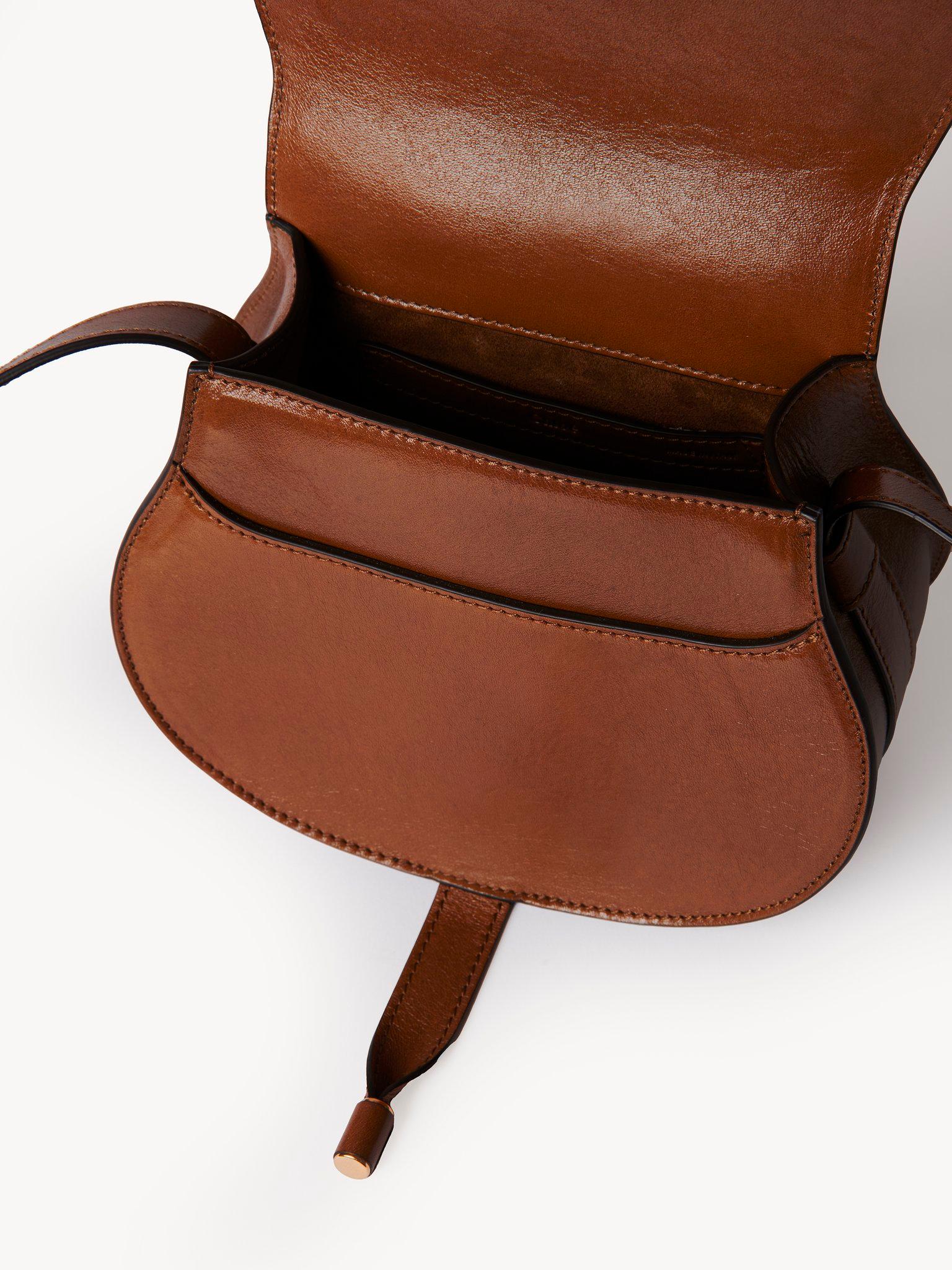 Small Marcie saddle bag in shiny leather Product Image
