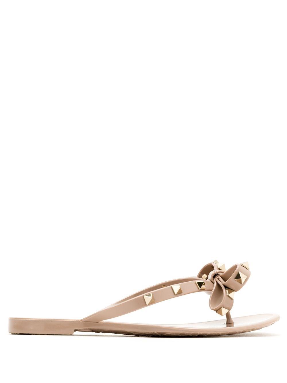 VALENTINO GARAVANI Women Rockstud Rubber Flip Flops In Beige Product Image