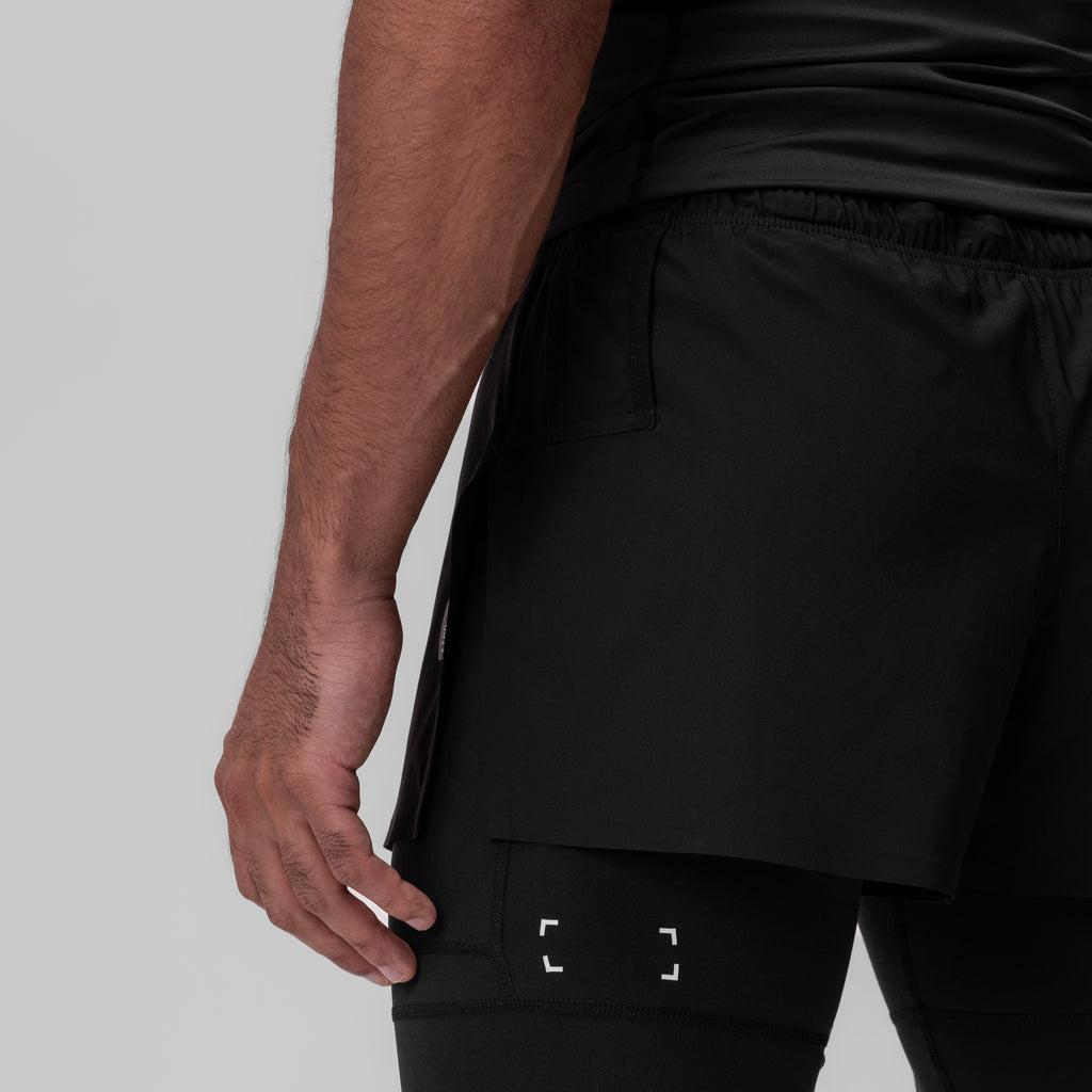 0911. Tetra-Lite® 2-in-1 High Split Legging Short - Black "Cyber"/Black Male Product Image