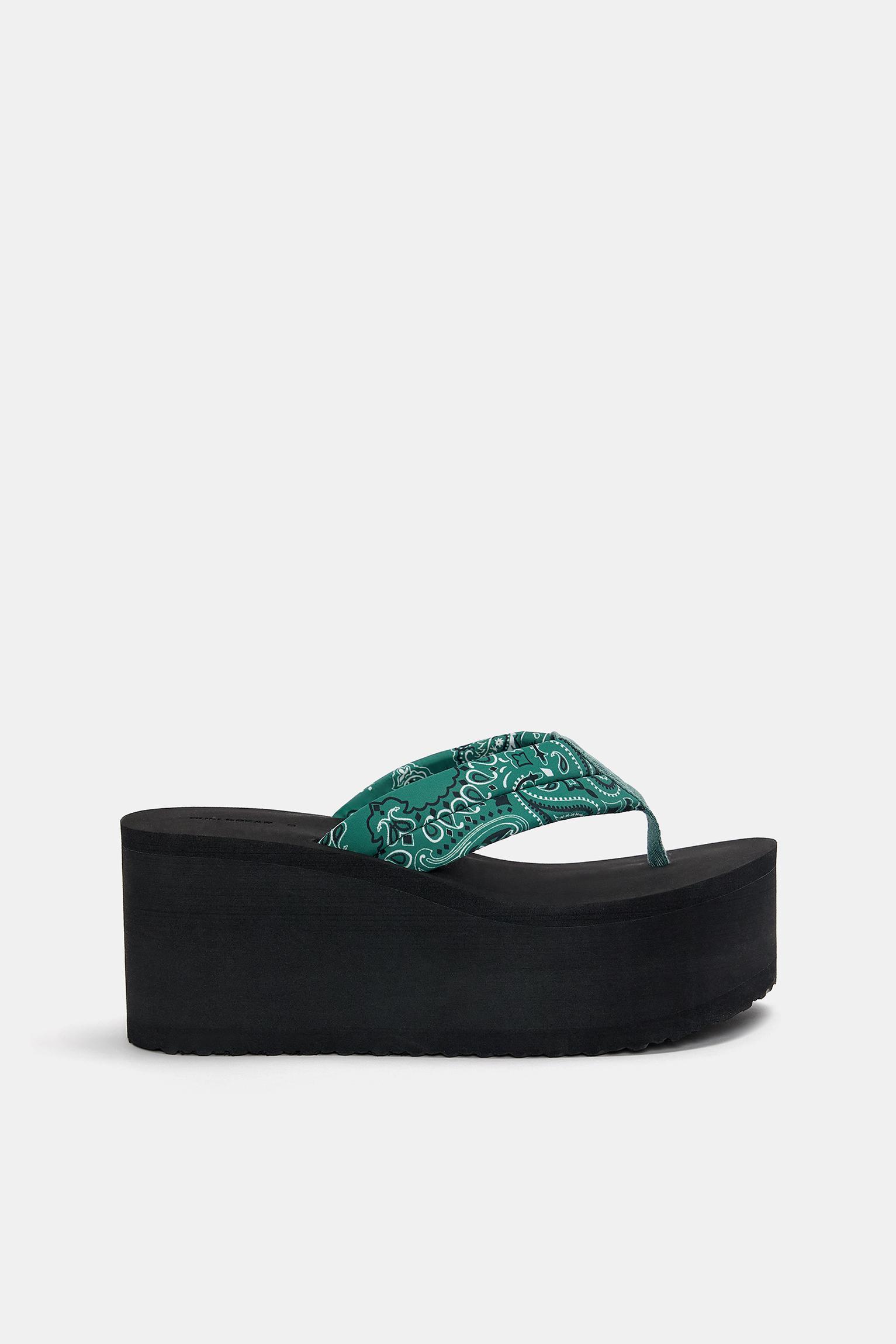 Wedge sandals with detail Product Image