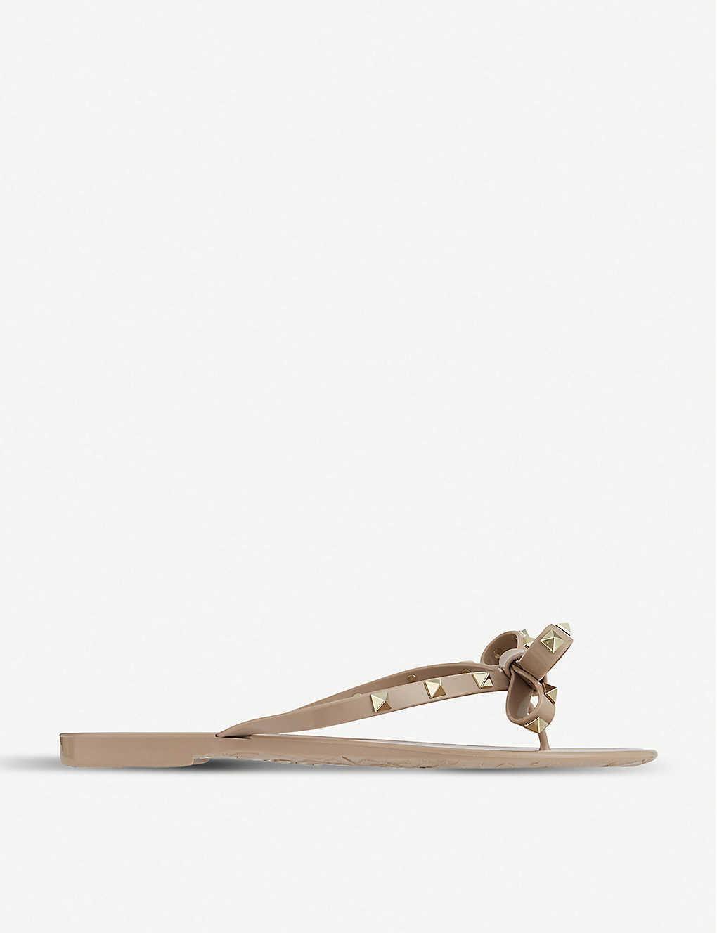 VALENTINO GARAVANI Women Rockstud Rubber Flip Flops In Beige Product Image