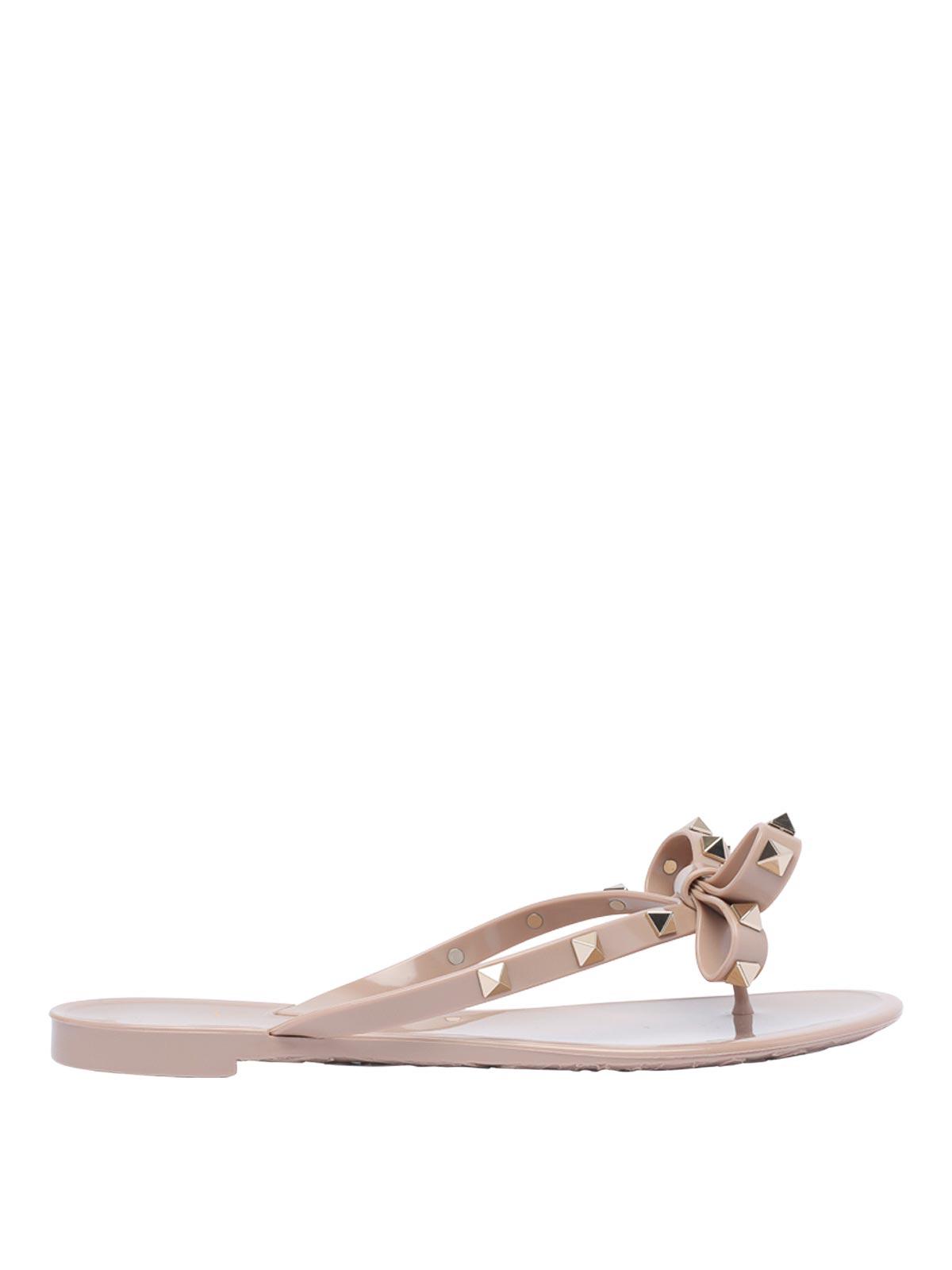 VALENTINO GARAVANI Women Rockstud Rubber Flip Flops In Beige Product Image