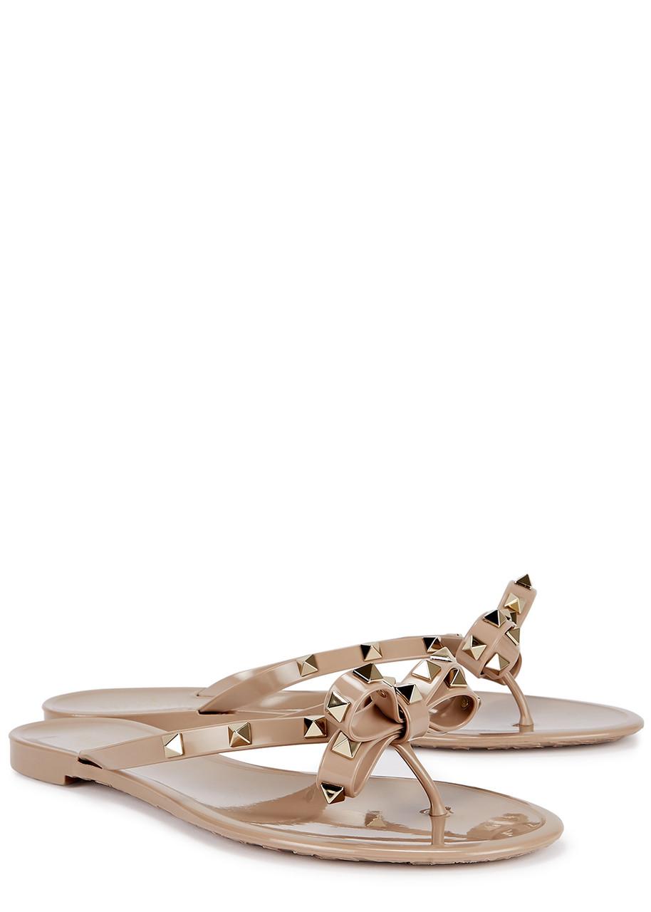 VALENTINO GARAVANI Women Rockstud Rubber Flip Flops In Beige Product Image