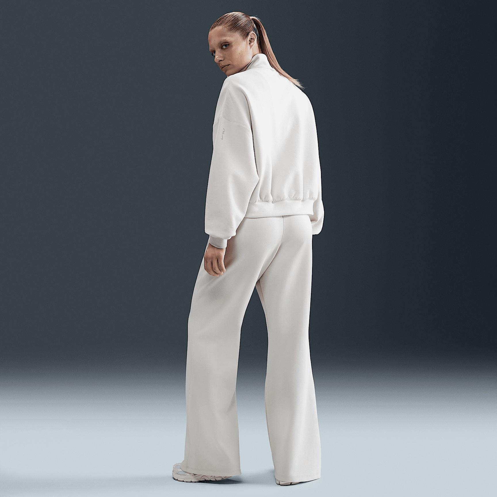 Nike Womens 24.7 ImpossiblySoft Dri-FIT High-Waisted Loose Flared Pants | HQ8607-104 Product Image