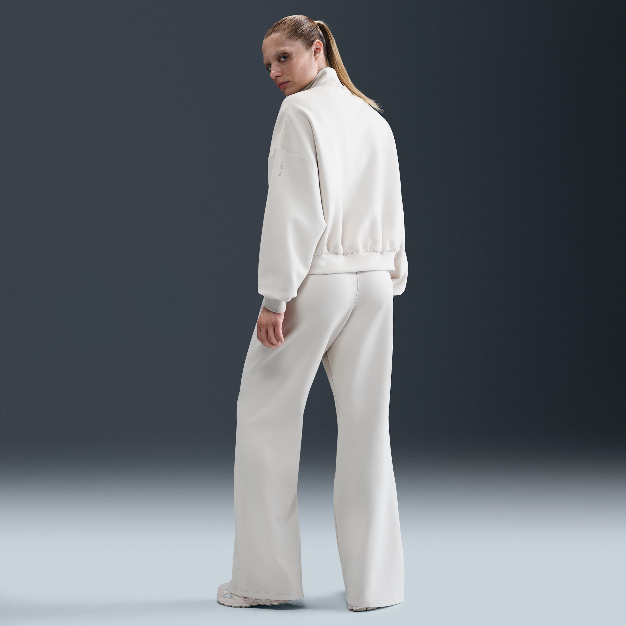 Nike Womens 24.7 ImpossiblySoft Dri-FIT High-Waisted Loose Flared Pants | HQ8607-104 Product Image