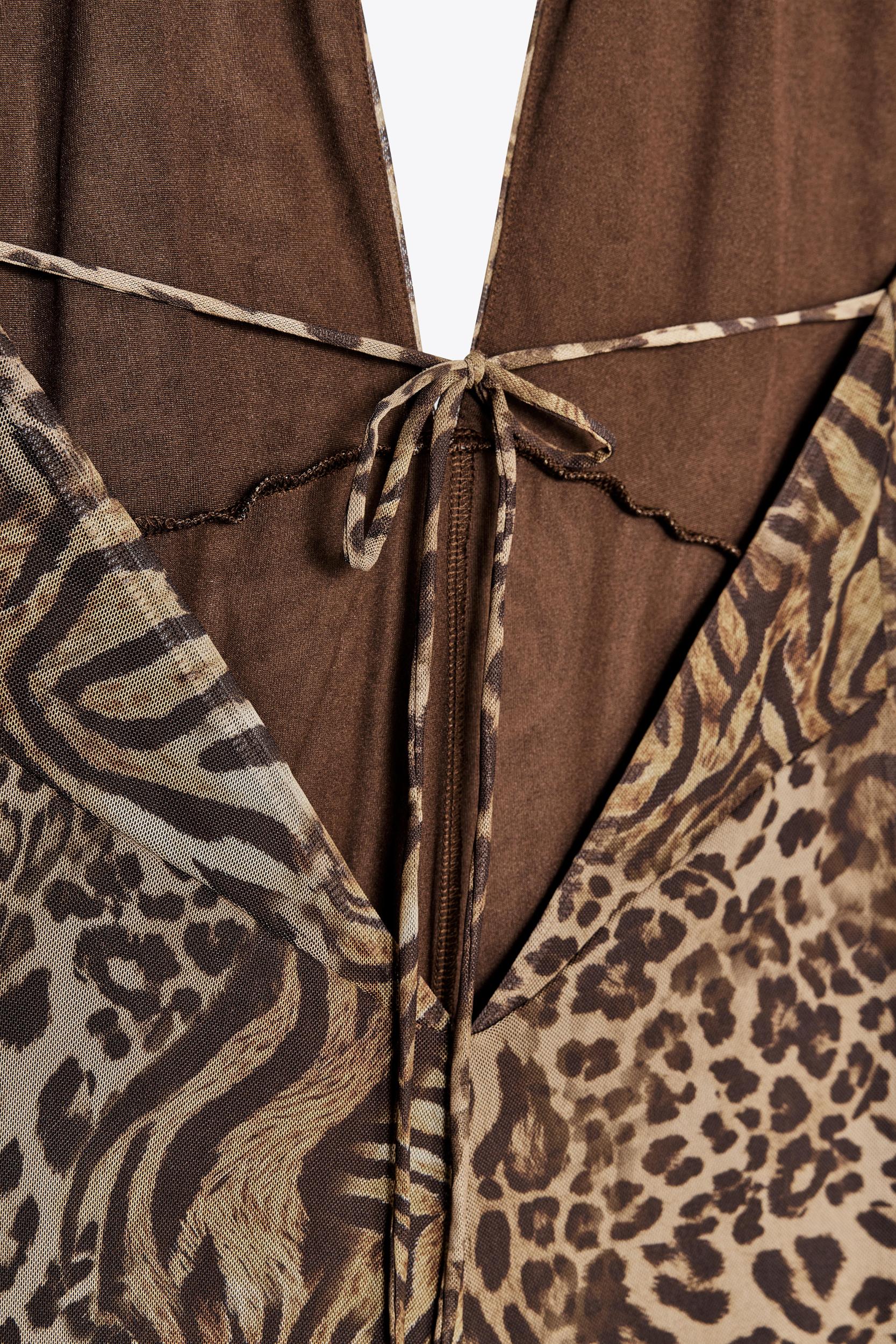 ANIMAL PRINT TULLE HALTER JUMPSUIT Product Image