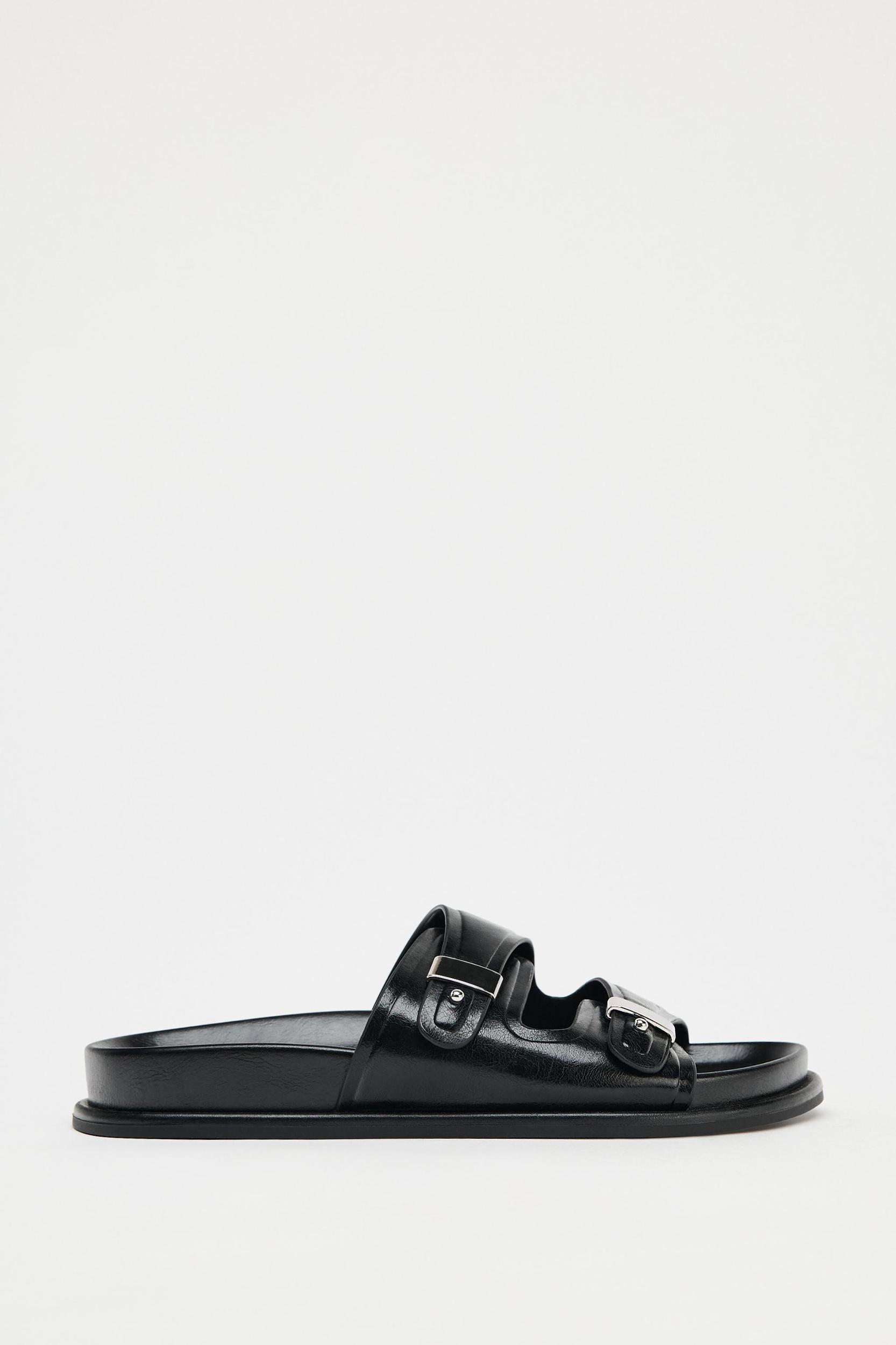 FLAT SANDALS WITH METALLIC DETAILS Product Image