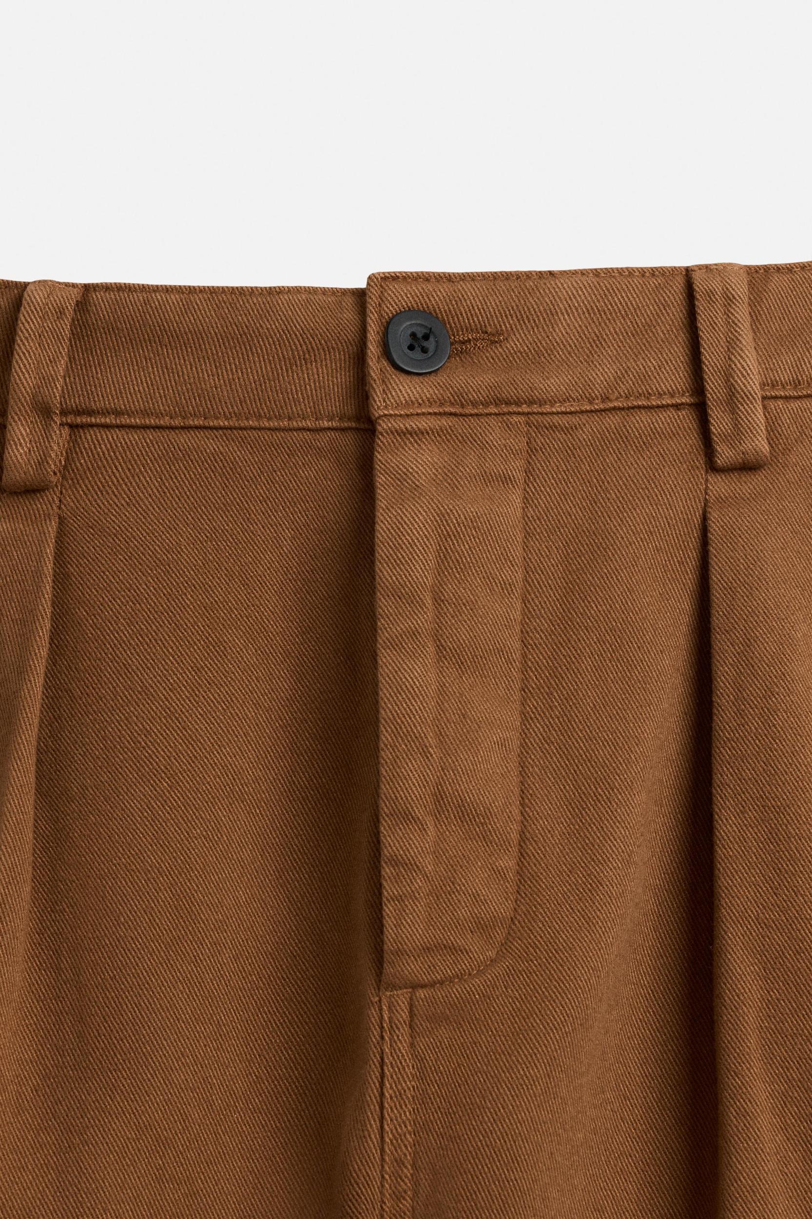 RELAXED FIT PLEATED BERMUDA SHORTS Product Image