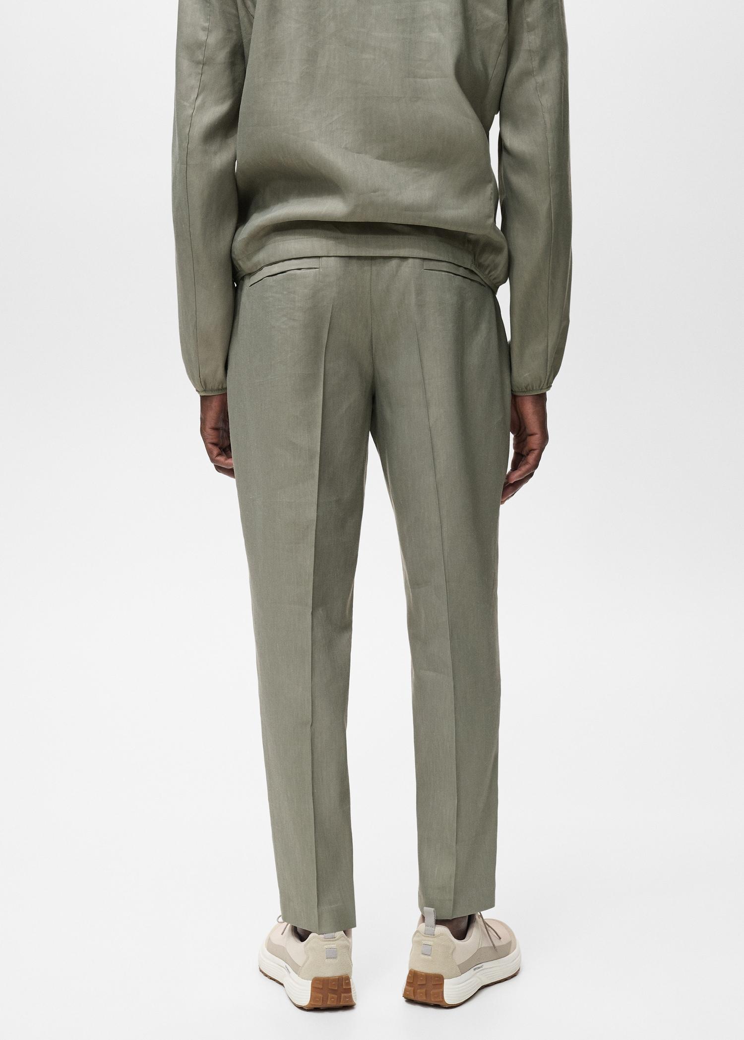 Pleated linen pants - Men | MANGO USA Product Image