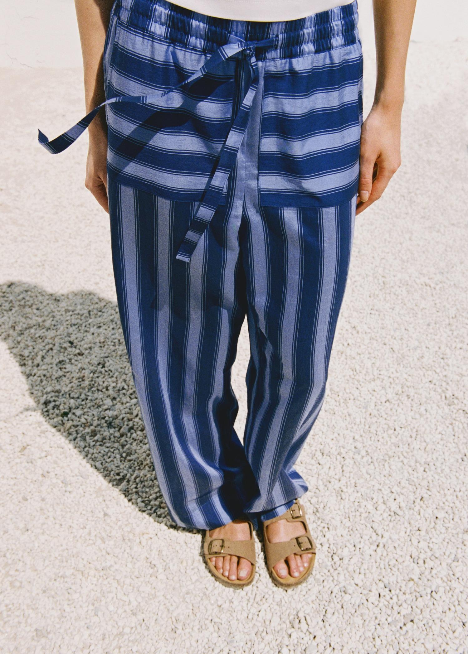 Woven lyocell pants with two-tone stripes - Women | MANGO USA Product Image
