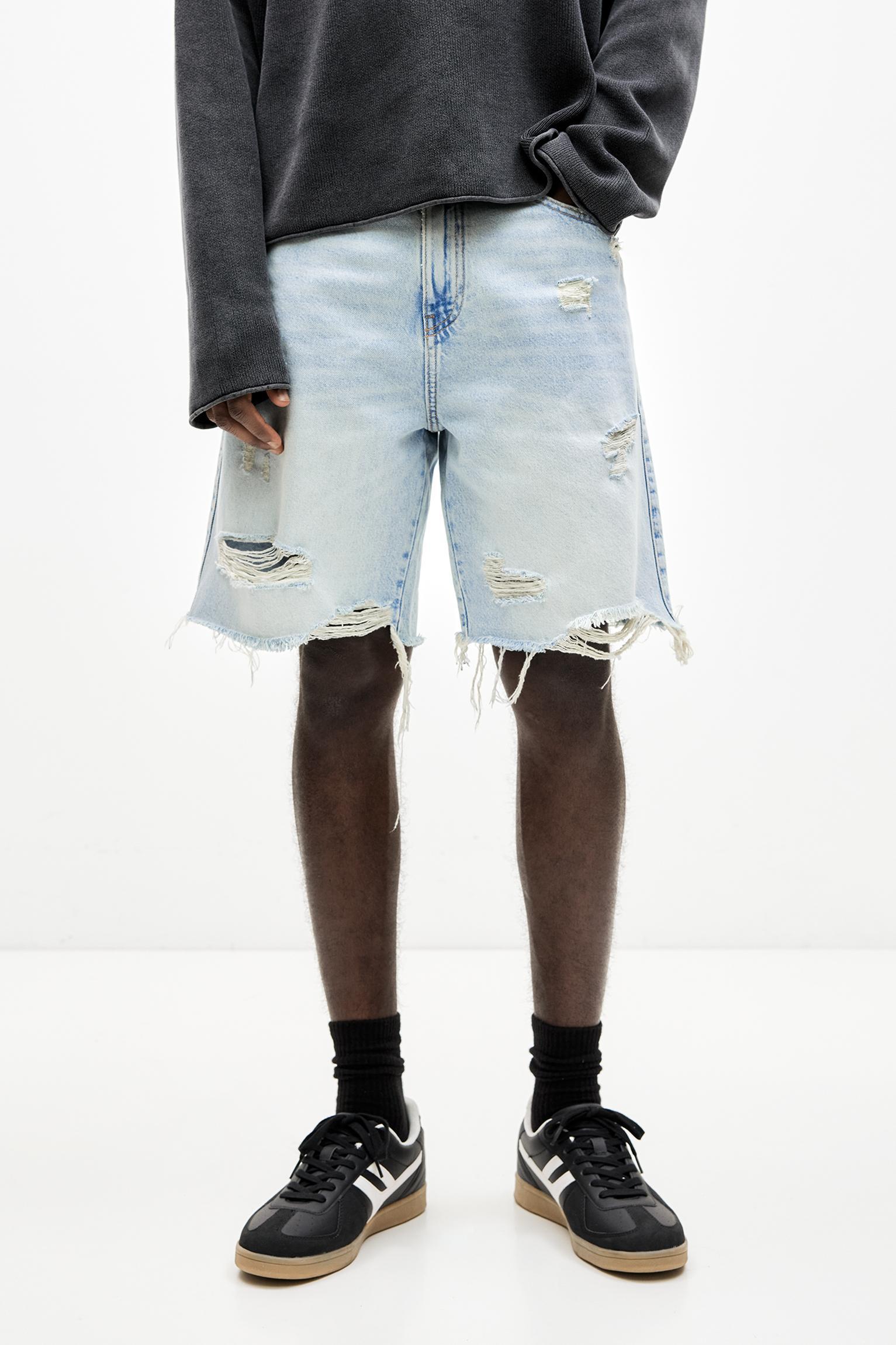 Ripped straight fit denim Bermuda shorts Product Image