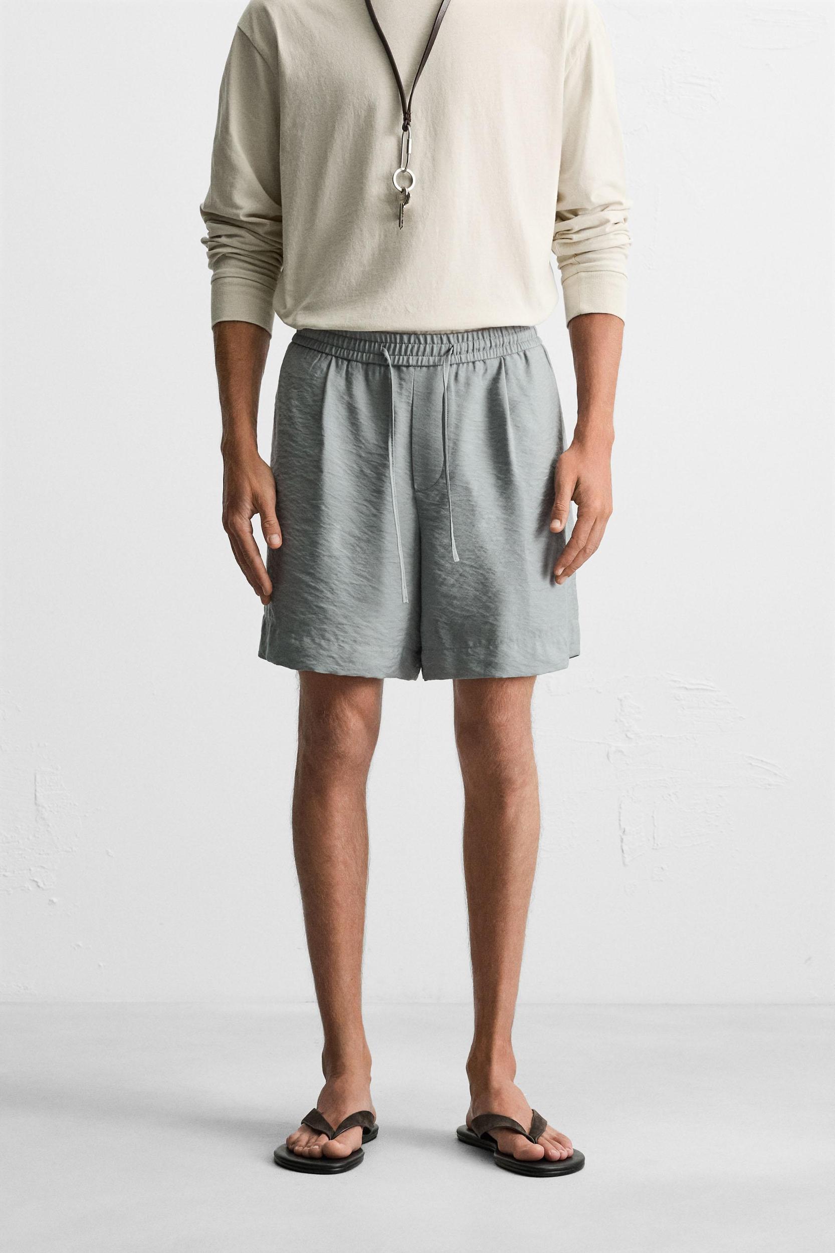 FLOWY RELAXED FIT BERMUDA SHORTS Product Image