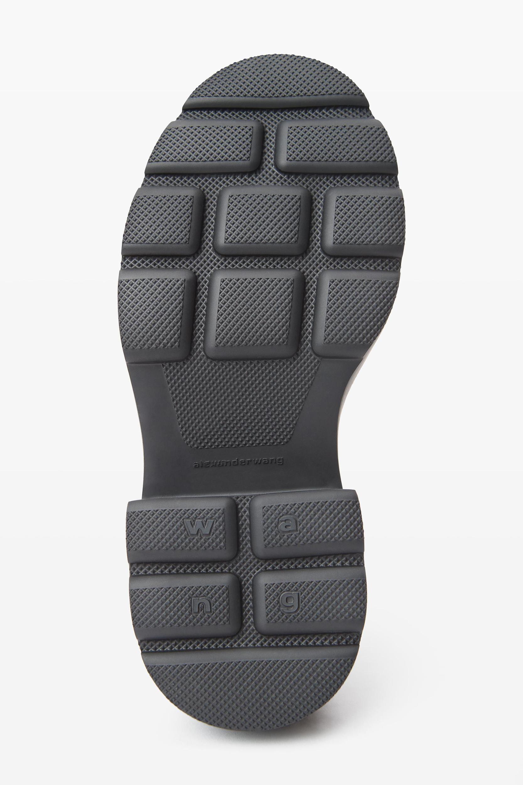 Carter 75mm Ankle Platform Boot In Rubber Product Image