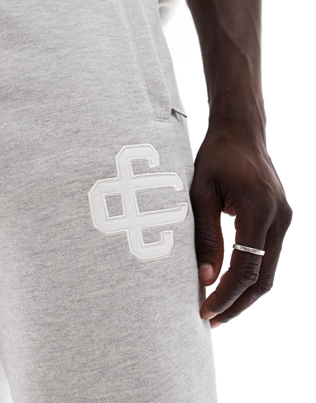 The Couture Club heavyweight emblem sweatpants in gray - part of a set Product Image
