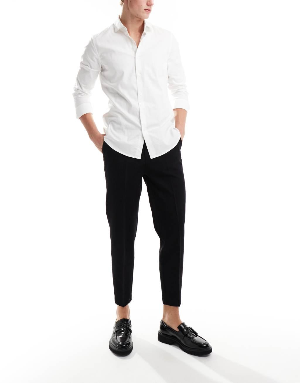 ASOS DESIGN dressy tapered fit pants in black Product Image