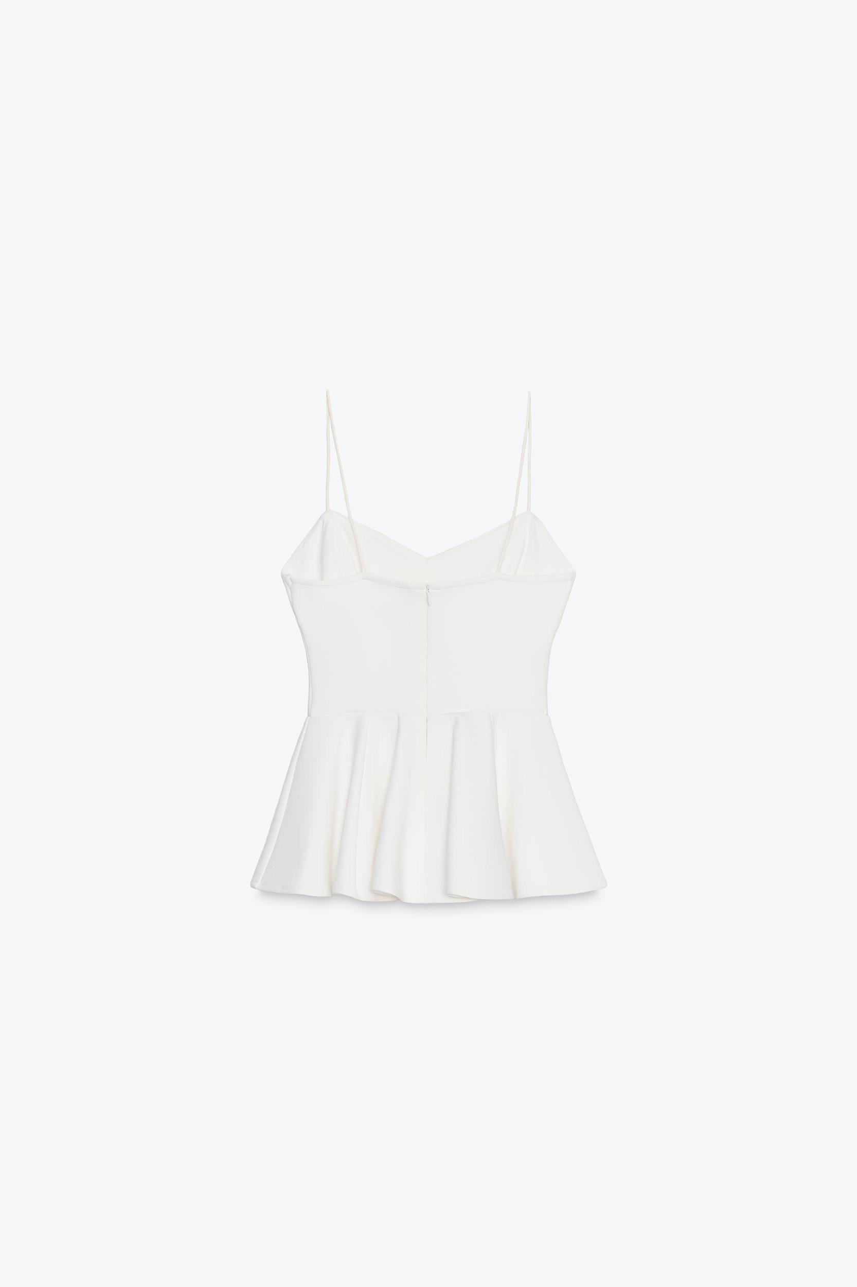 INTERLOCK PEPLUM STRAPPY TOP Product Image
