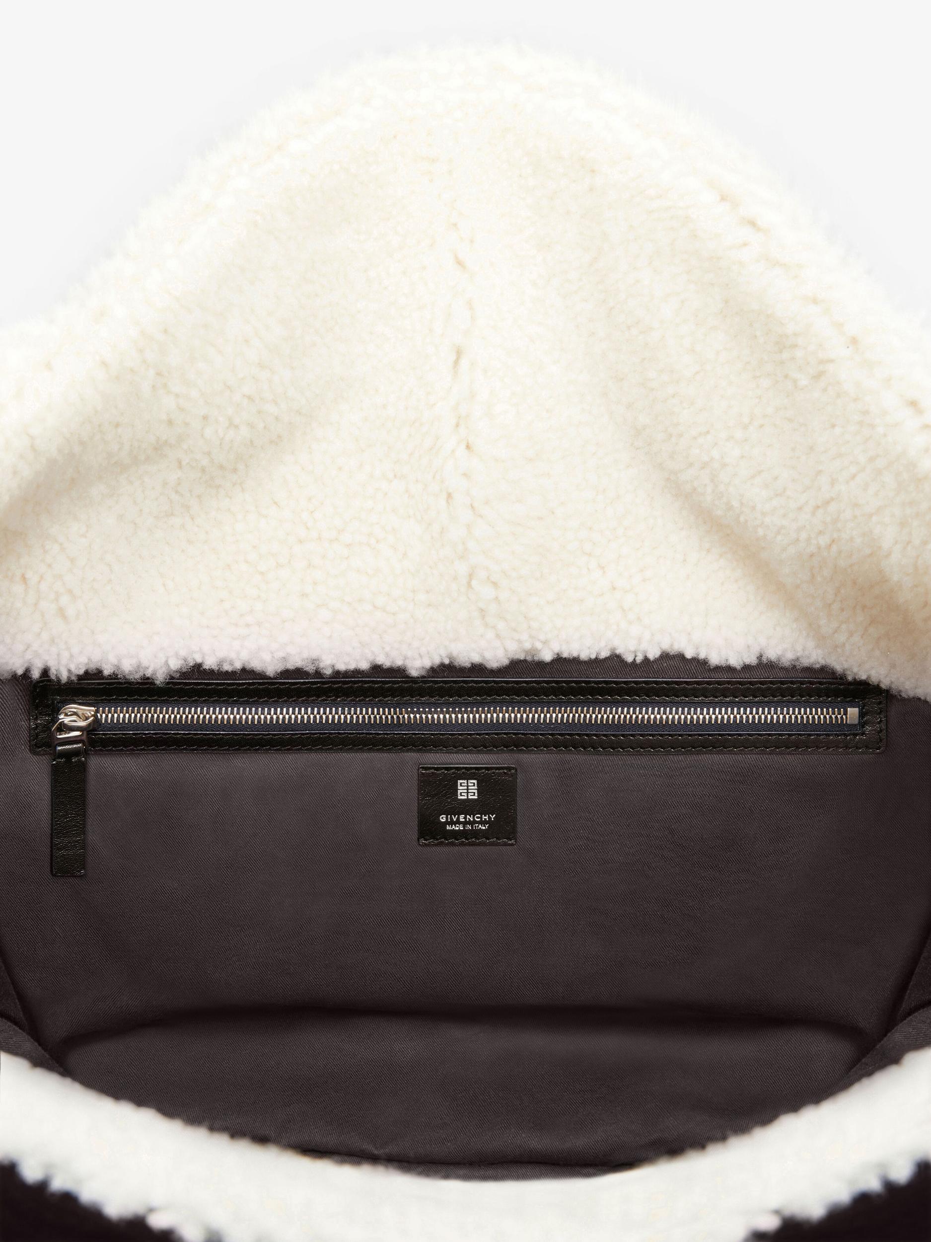 Large Voyou bag in shearling Product Image
