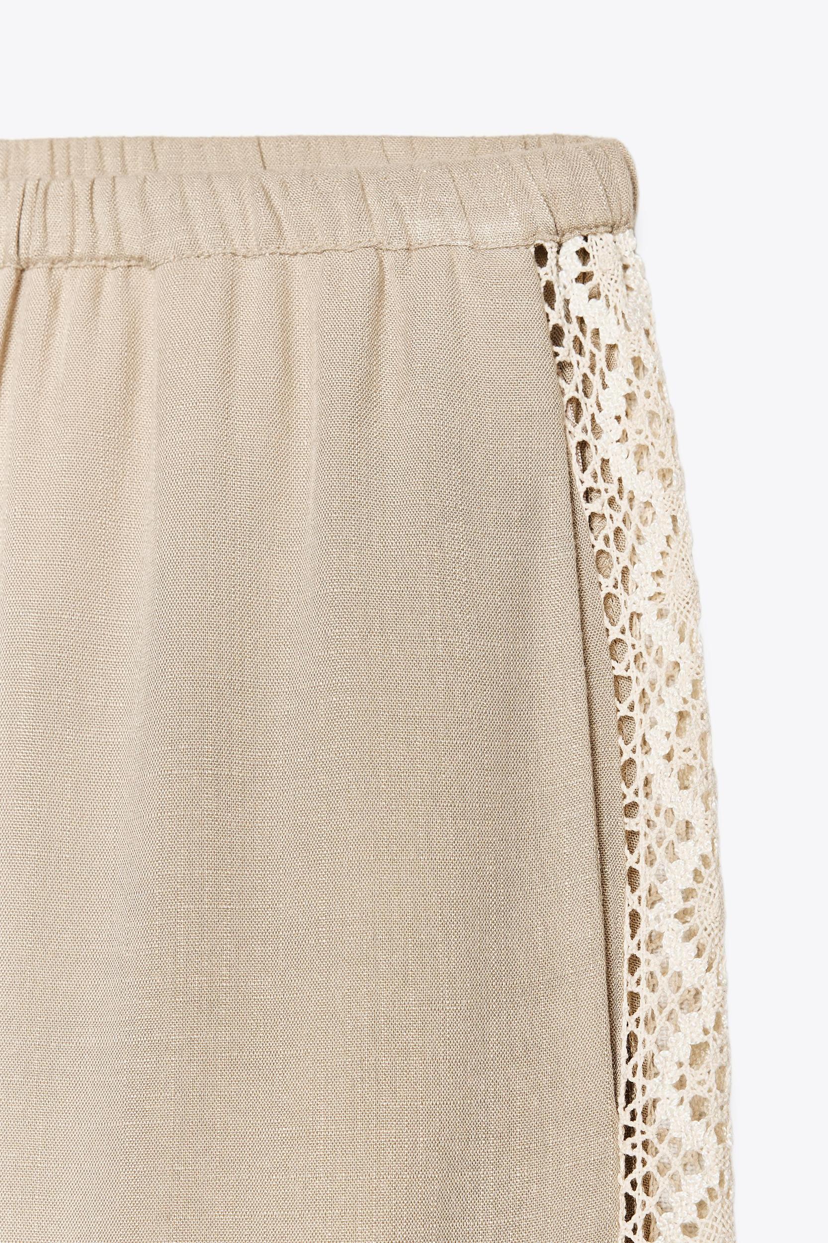 WIDE LEG PANTS WITH EMBROIDERED SIDE STRIPES Product Image