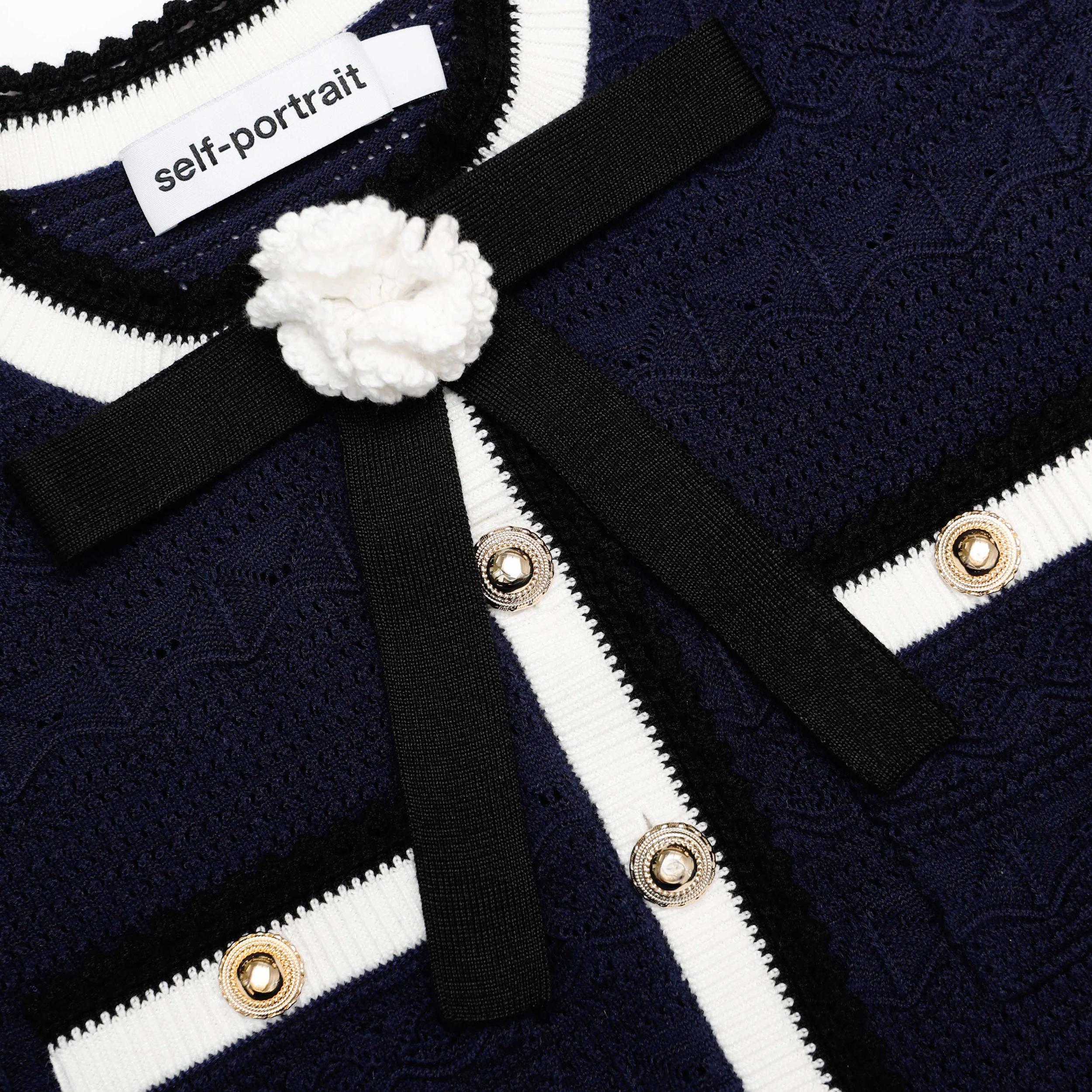 Navy Peplum Pointelle Knit Top Product Image