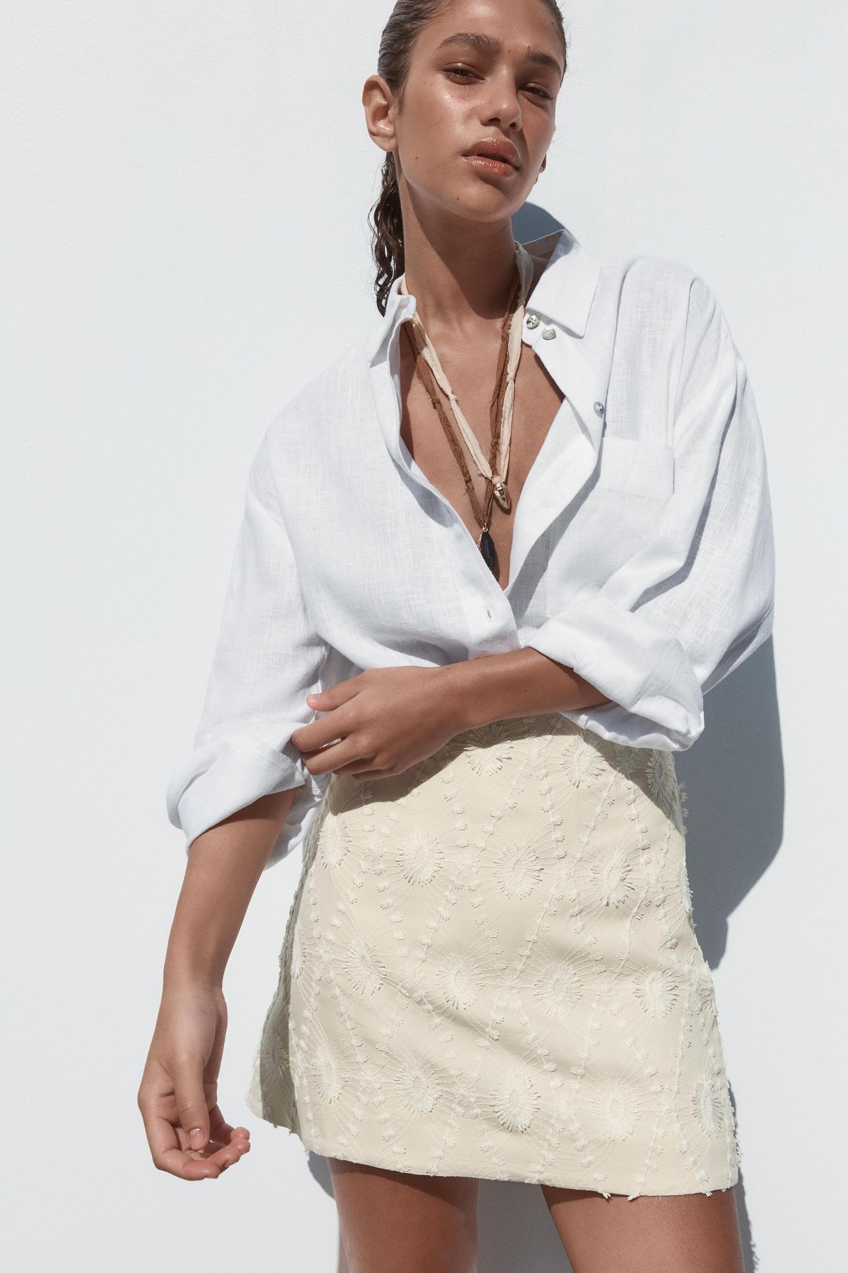 MINI SKIRT WITH FRAYED EMBROIDERY Product Image