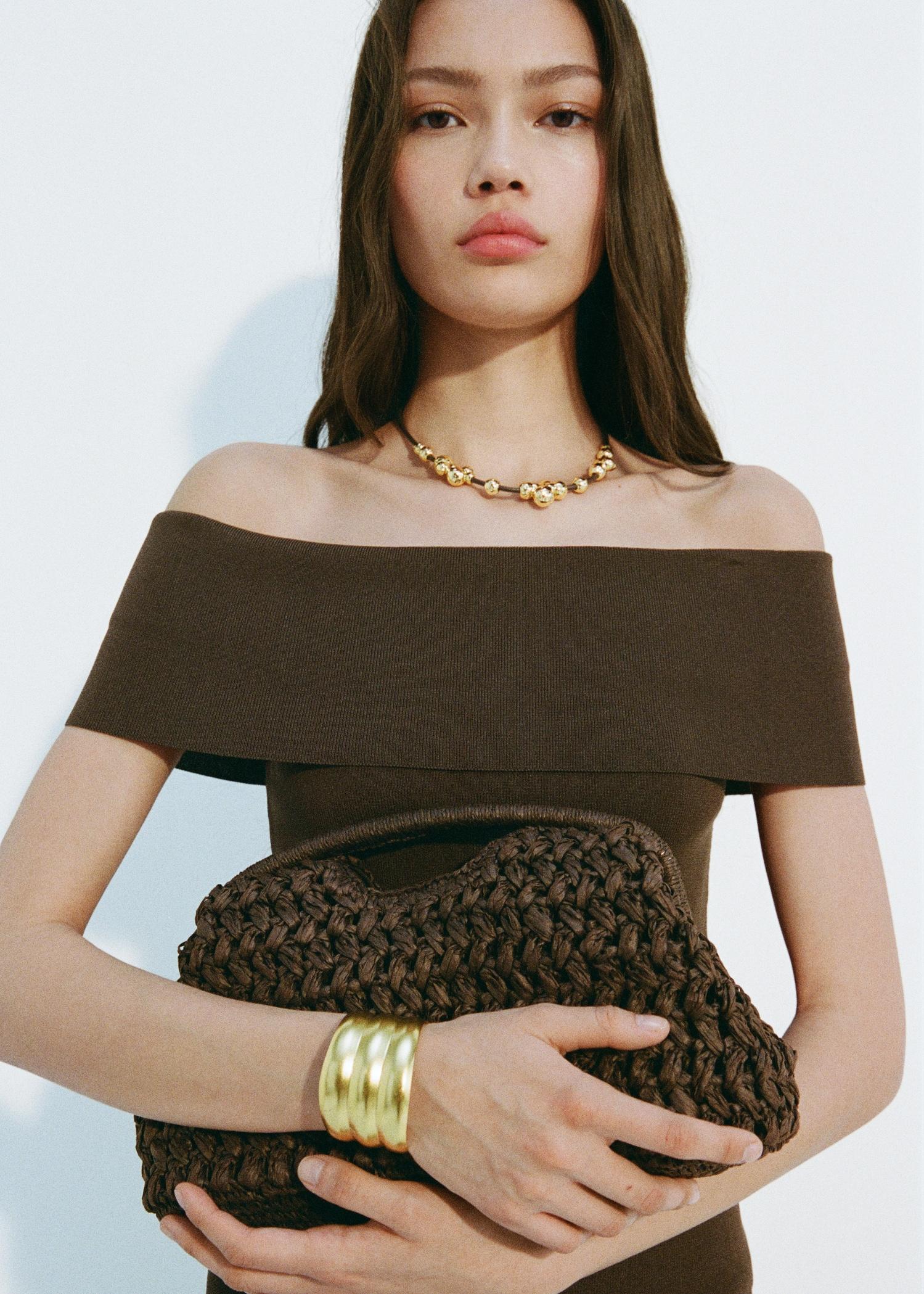 Off-the-shoulder knitted top - Women | MANGO USA Product Image