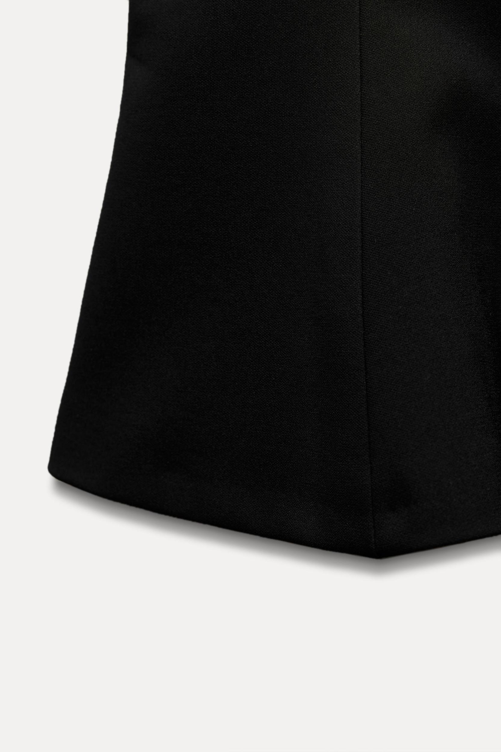 STRETCHY PEPLUM TOP Product Image