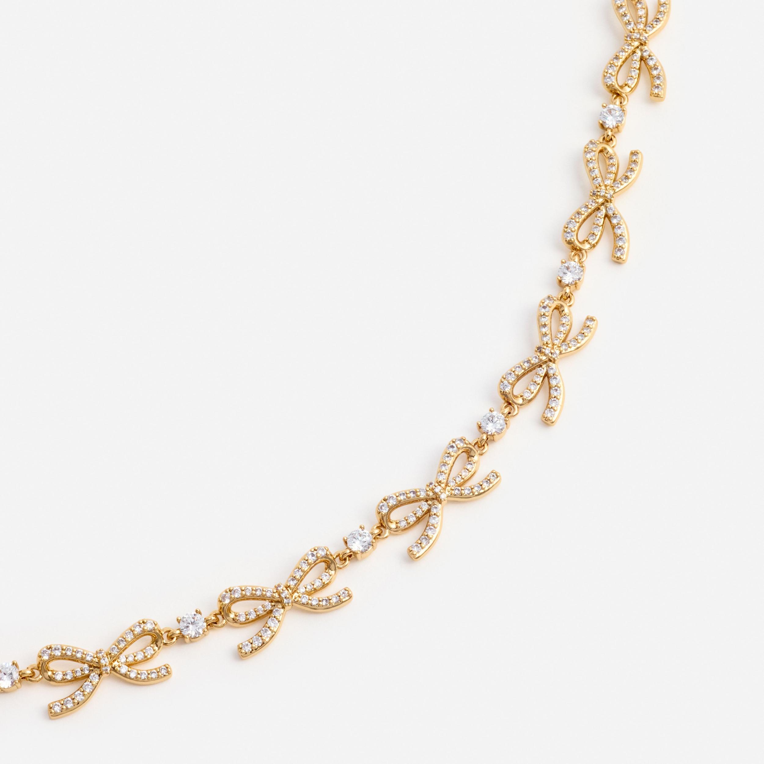 Gold Crystal Bows Necklace Product Image