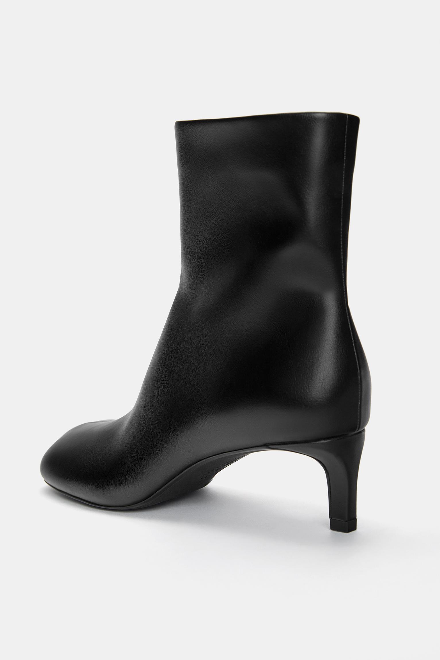 High-heel ankle boots with round toe Product Image