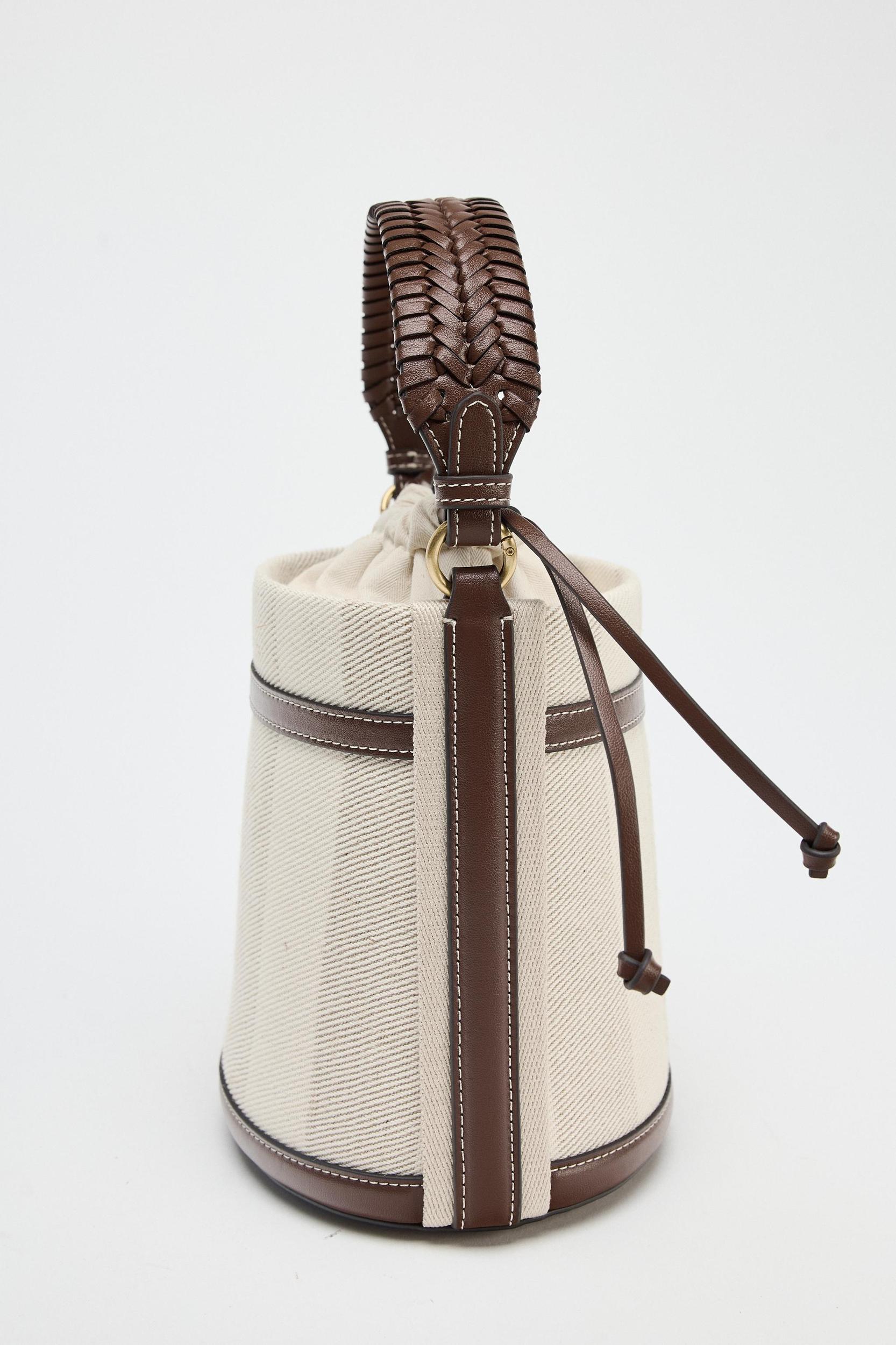 STRIPED CANVAS BUCKET BAG Product Image