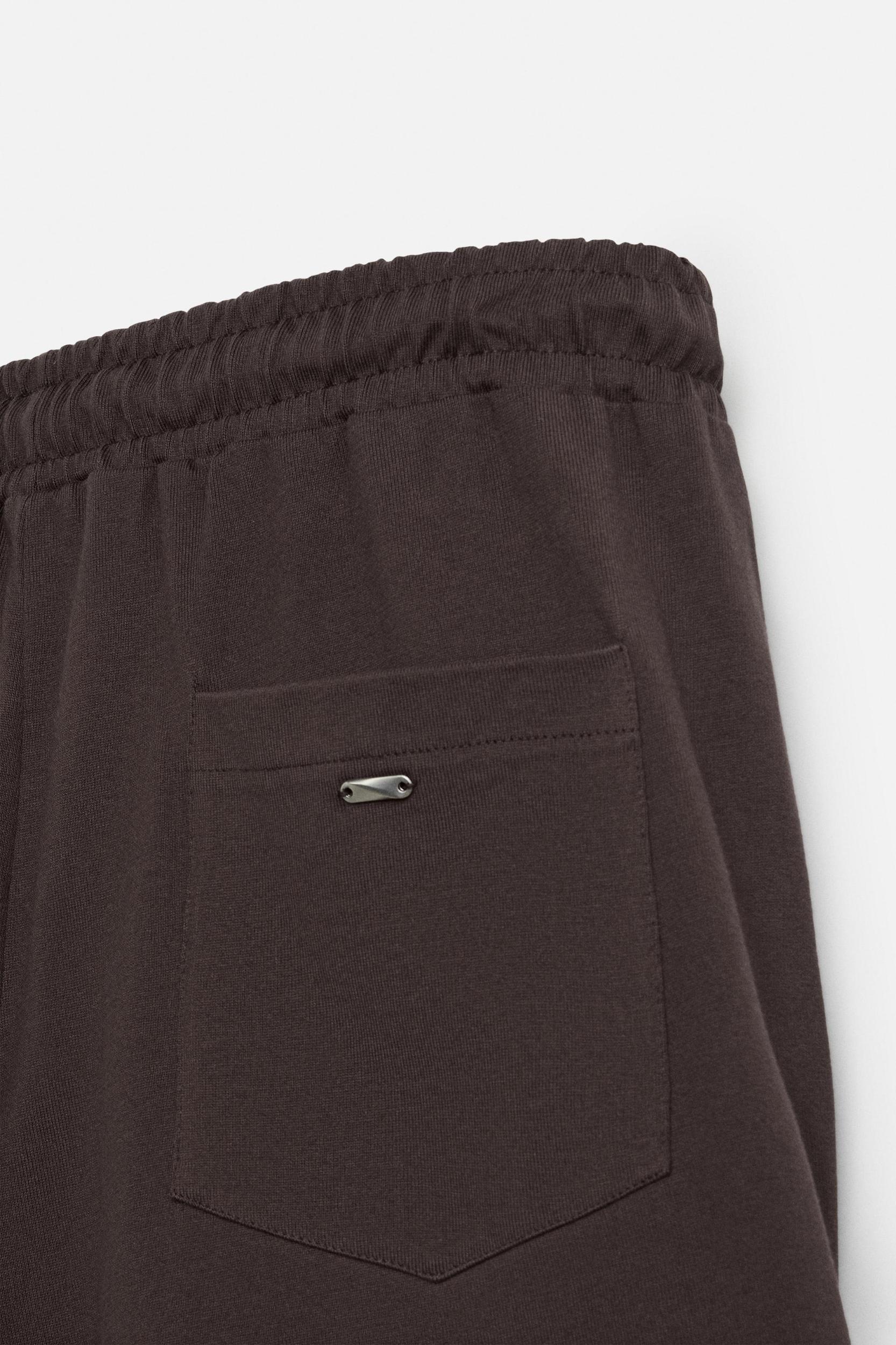 PLEATED OVERSIZED FIT BERMUDA SHORTS Product Image