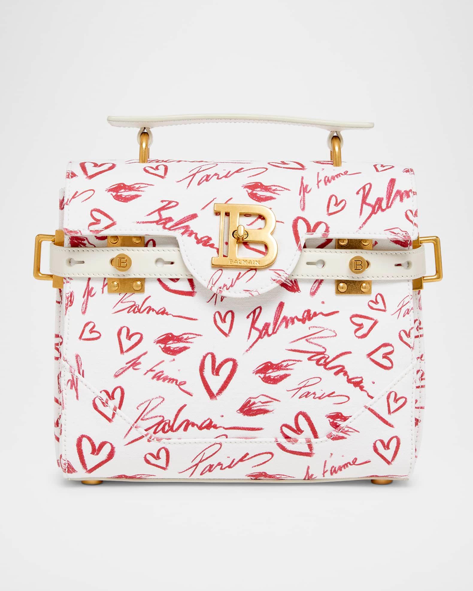 B-Buzz 23 Top-Handle Bag in Lipstick-Print Canvas  Product Image