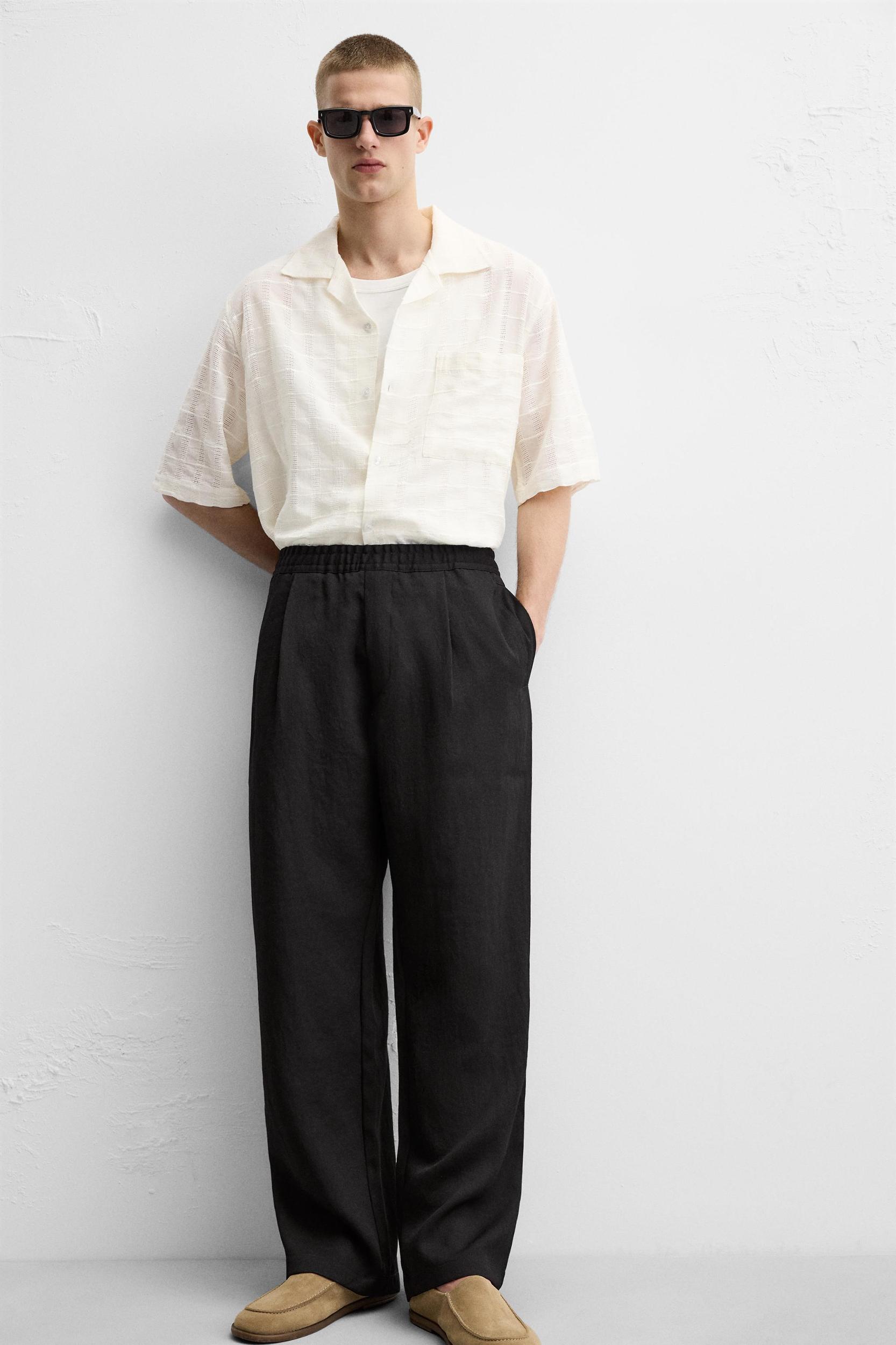 FLOWY PLEATED PANTS Product Image