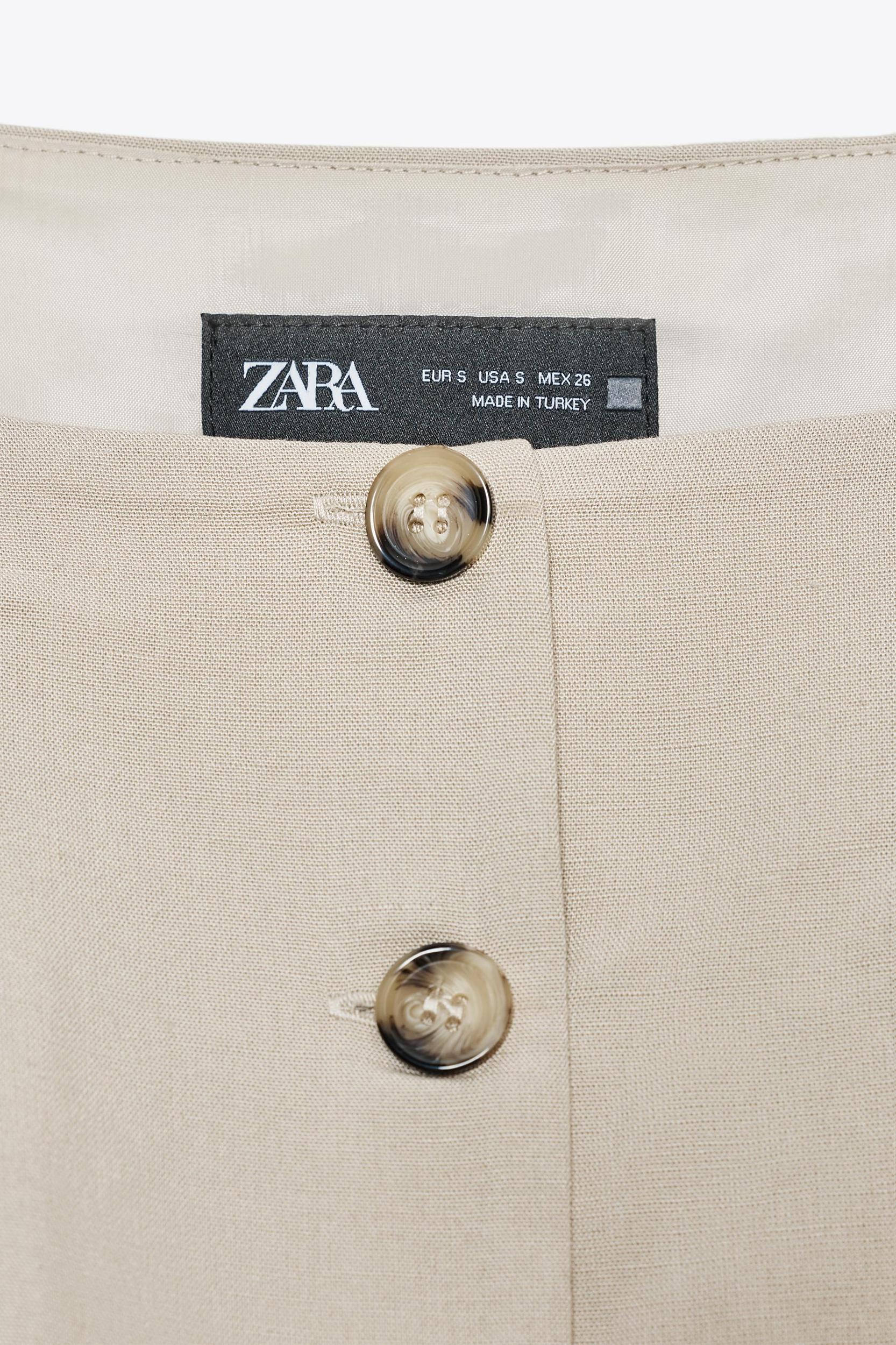 PLEATED SKIRT MIDI WAISTCOAT DRESS Product Image