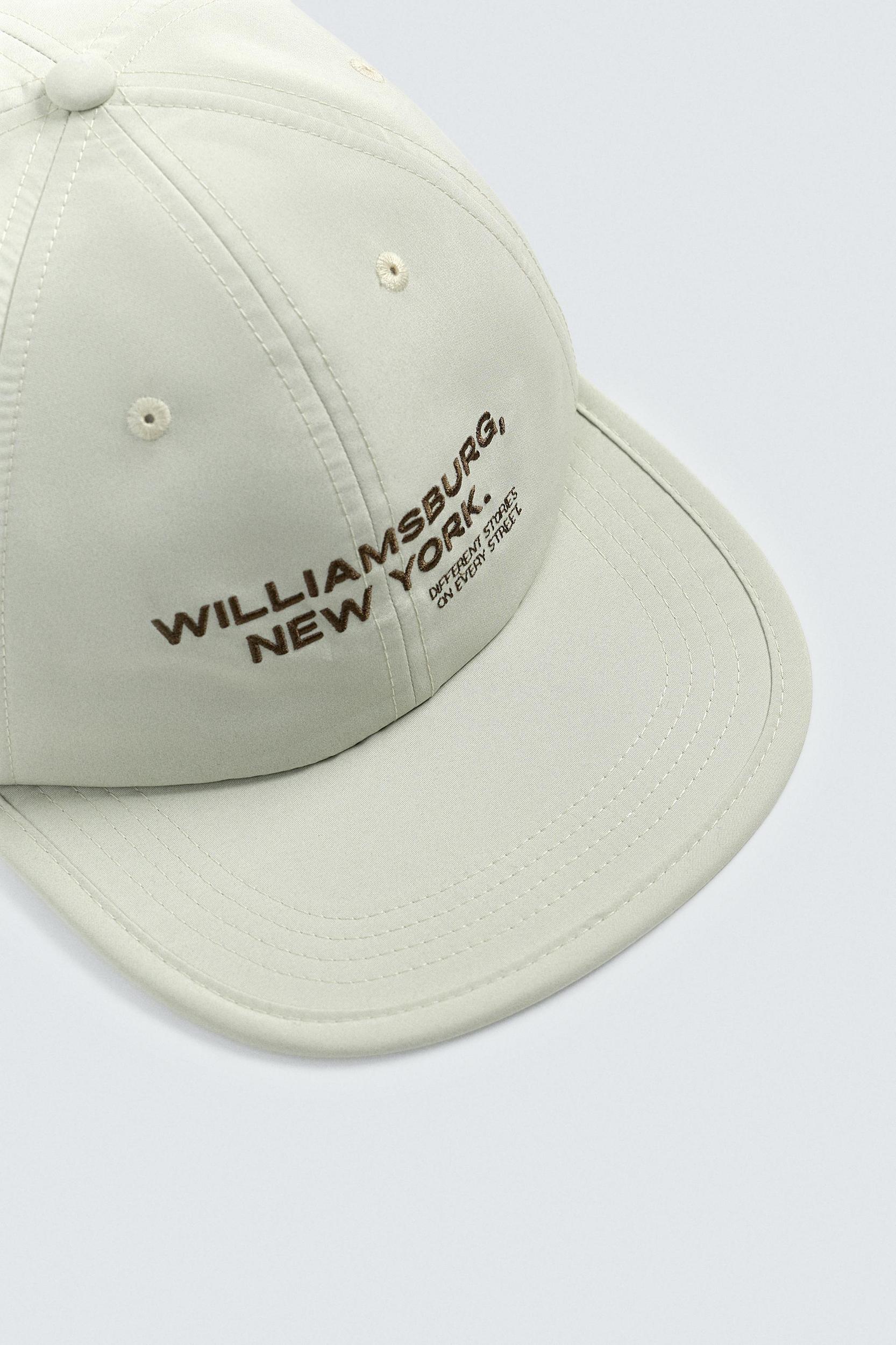 EMBROIDERED FLAT VISOR CAP Product Image