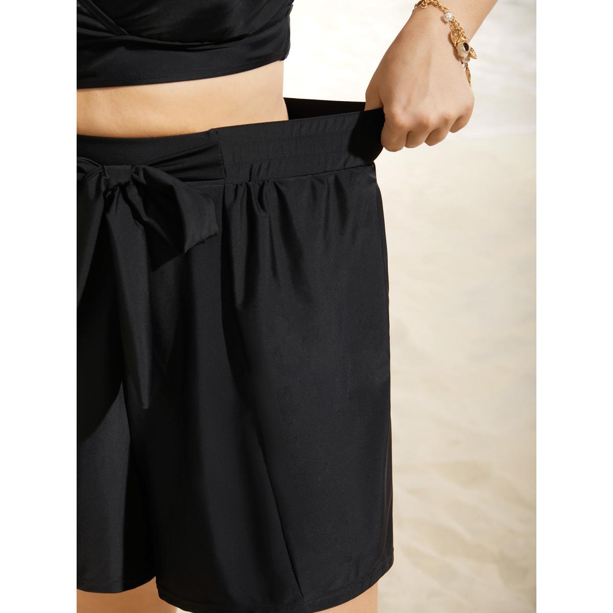 Plus Size High Rise Tie Knot Wideband Waist Swim Bottom Women's Swimwear Black Beach Tie knot High stretch Bodycon High Rise Side seam pocket Curve Swim Bottoms BloomChic 22-24/3X Product Image