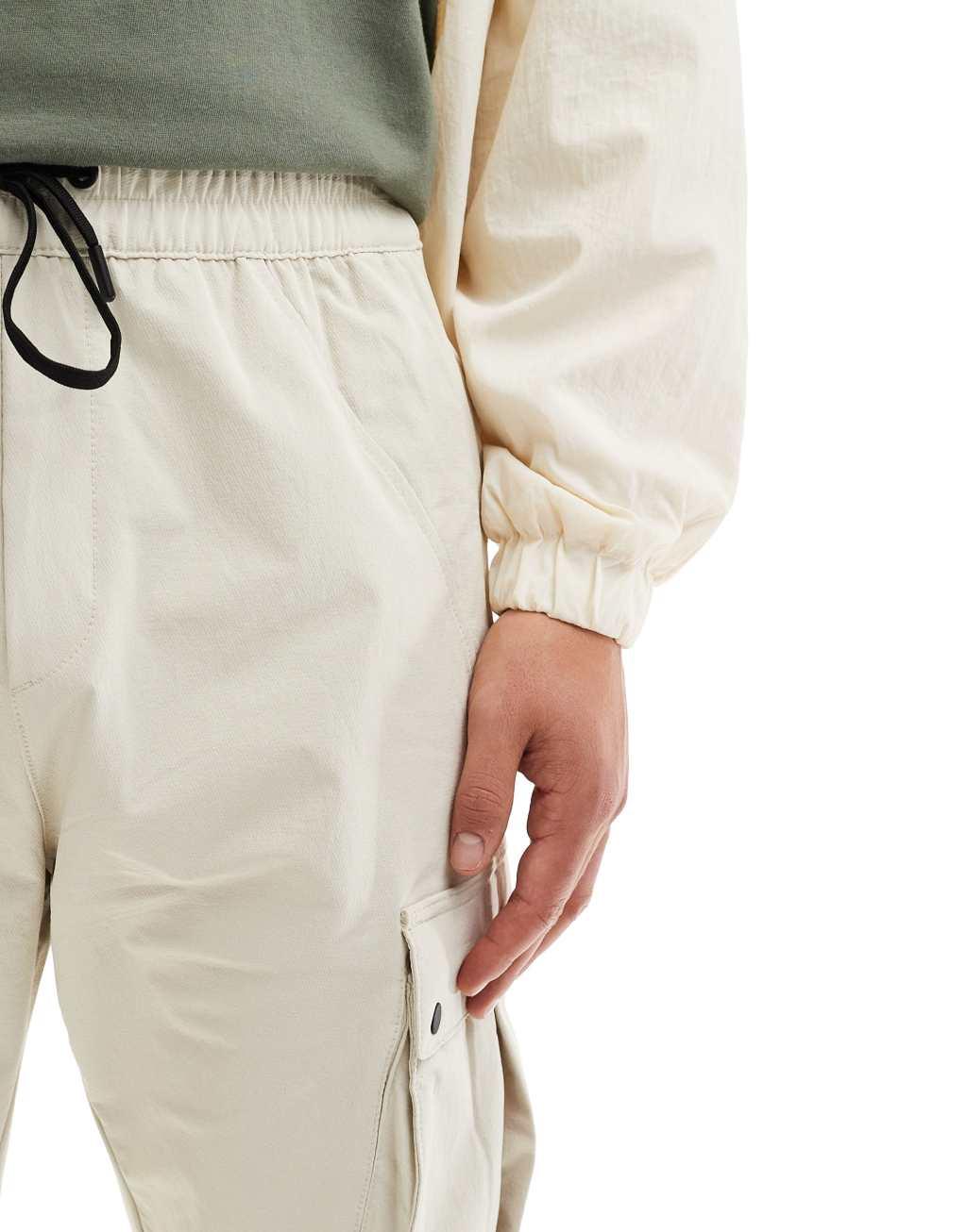 Bershka tech cargo pants in sand Product Image